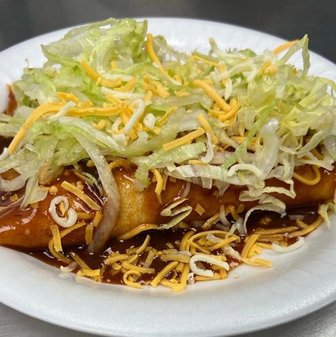 (2) Cheese Enchiladas.