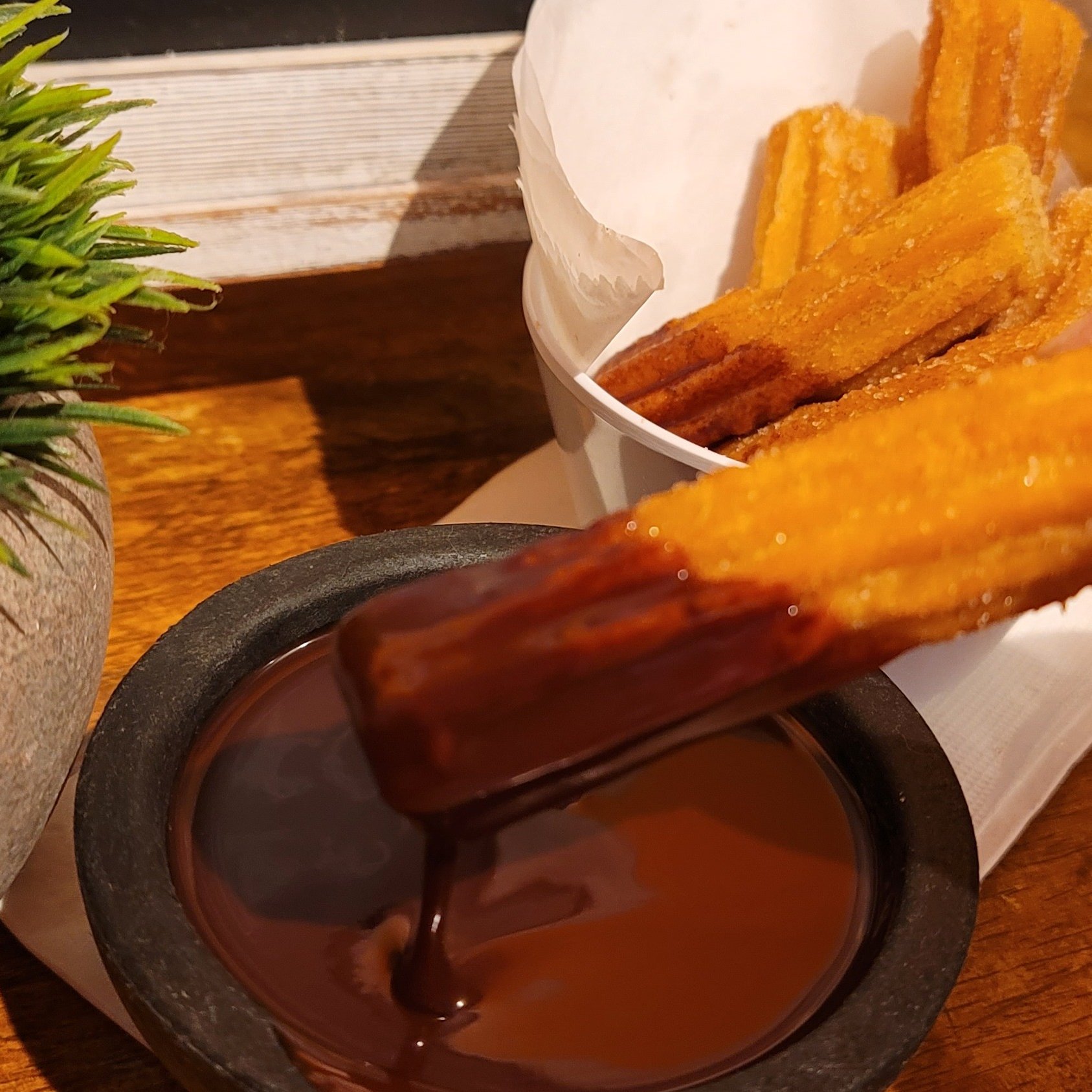 Churros with chocolate syrup