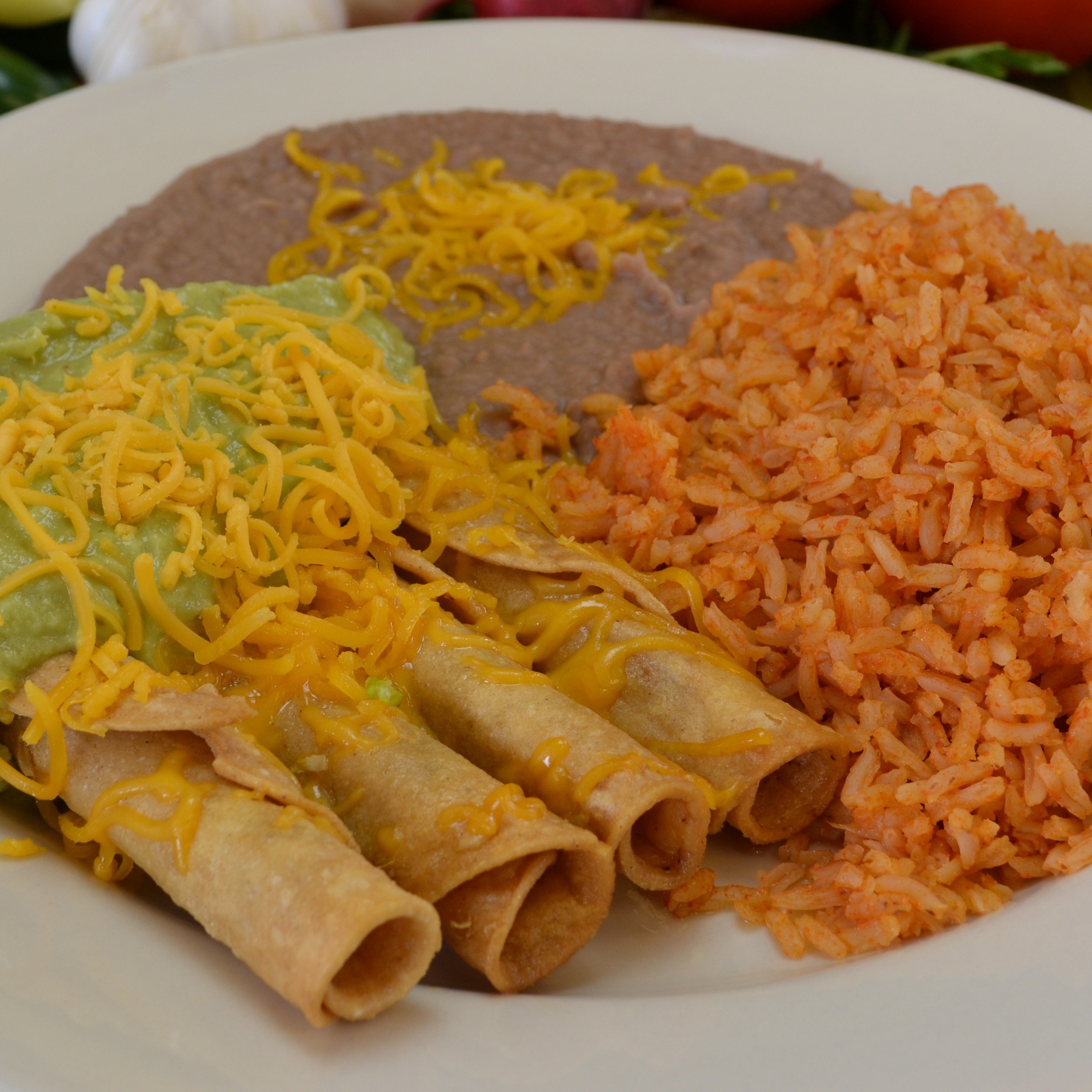 #6 Four Rolled Tacos Combo.