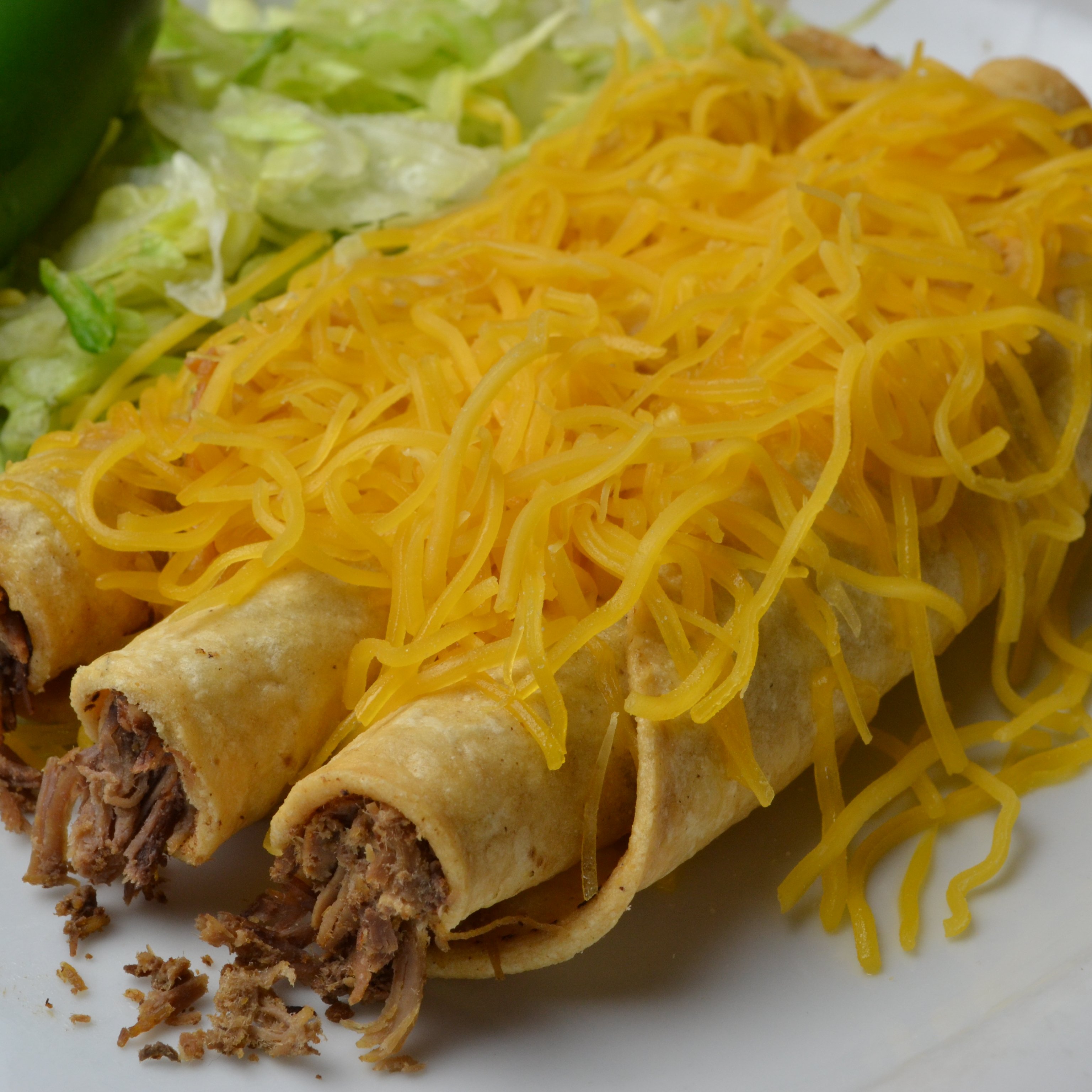 #2 3 Rolled Tacos with Cheese