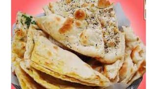 Naan Platter- (Garlic,Onion,Butter,Paneer,Aloo,Methi)