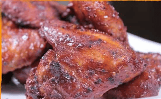 3 Jumbo Smoked Chicken Wings or jumbo smoked legs with 2 Regular Sides