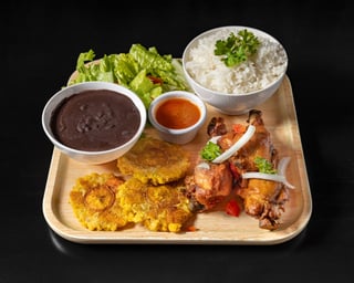 Chicken Fried  (served with plantain and 1 choice of white rice, rice and beans,  djondjon rice or  white rice and beans sauce)