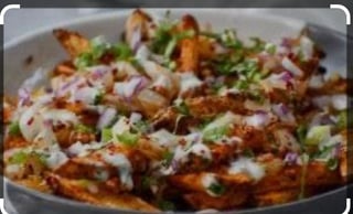 Philly Masala cheesy fries