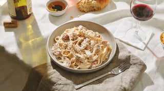 Chicken Fettuccine Alfredo (Grilled Chicken, Fettuccine, Alfredo sauce topped with fresh Parmesan cheese)