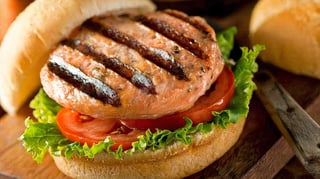 Salmon Burger served w/ fries.