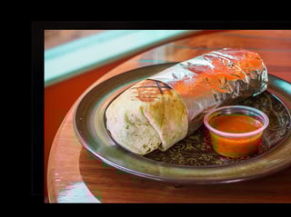 Chicken,Rice & Beans Burrito with fries.