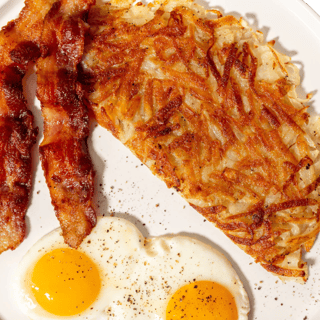 2 Eggs Any Style W/Bacon Box