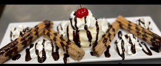 Churros w/ vanilla Ice cream