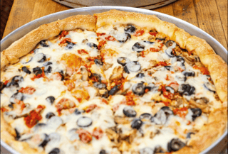 Mushrooms, Black Olives, Roasted Peppers & Fresh Garlic Pie