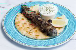 (1) PORK SOUVLAKI SKEWER W/ PITA & TZATZIKI