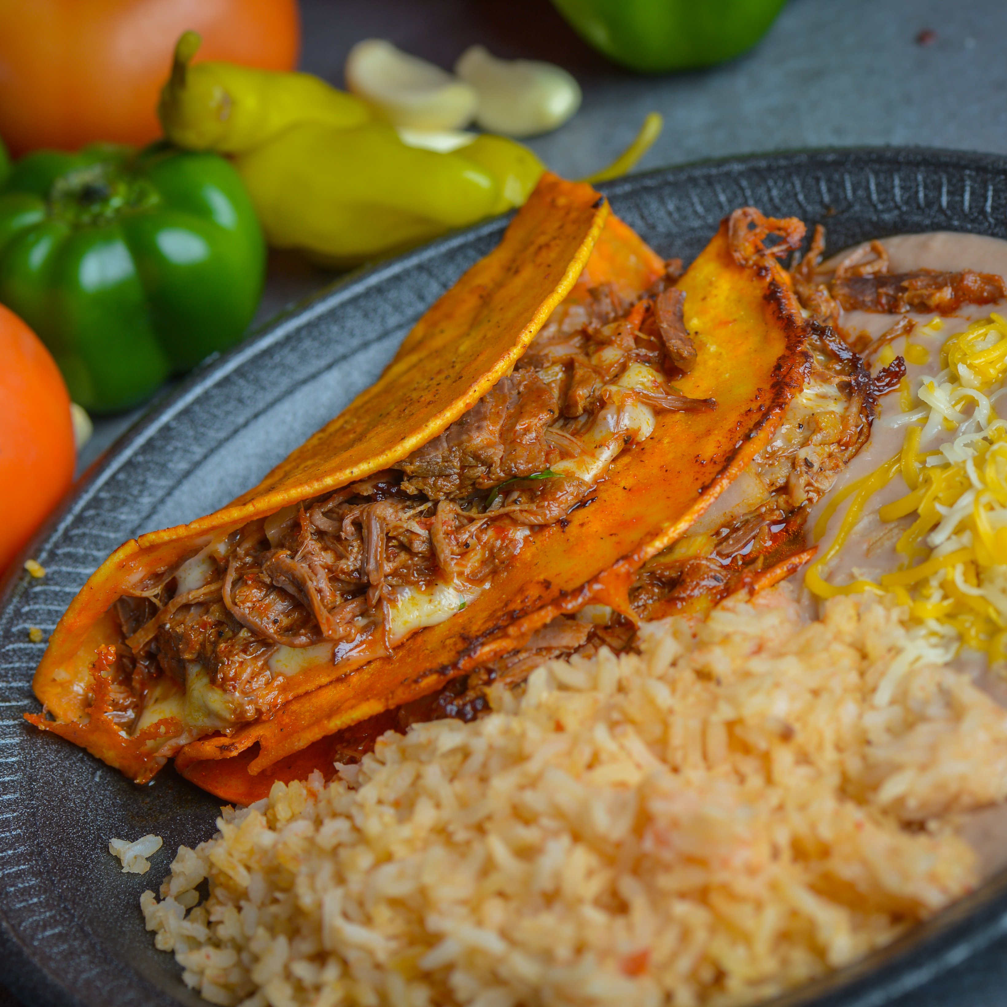 #4 Two Birria Tacos with Consomé Combo.