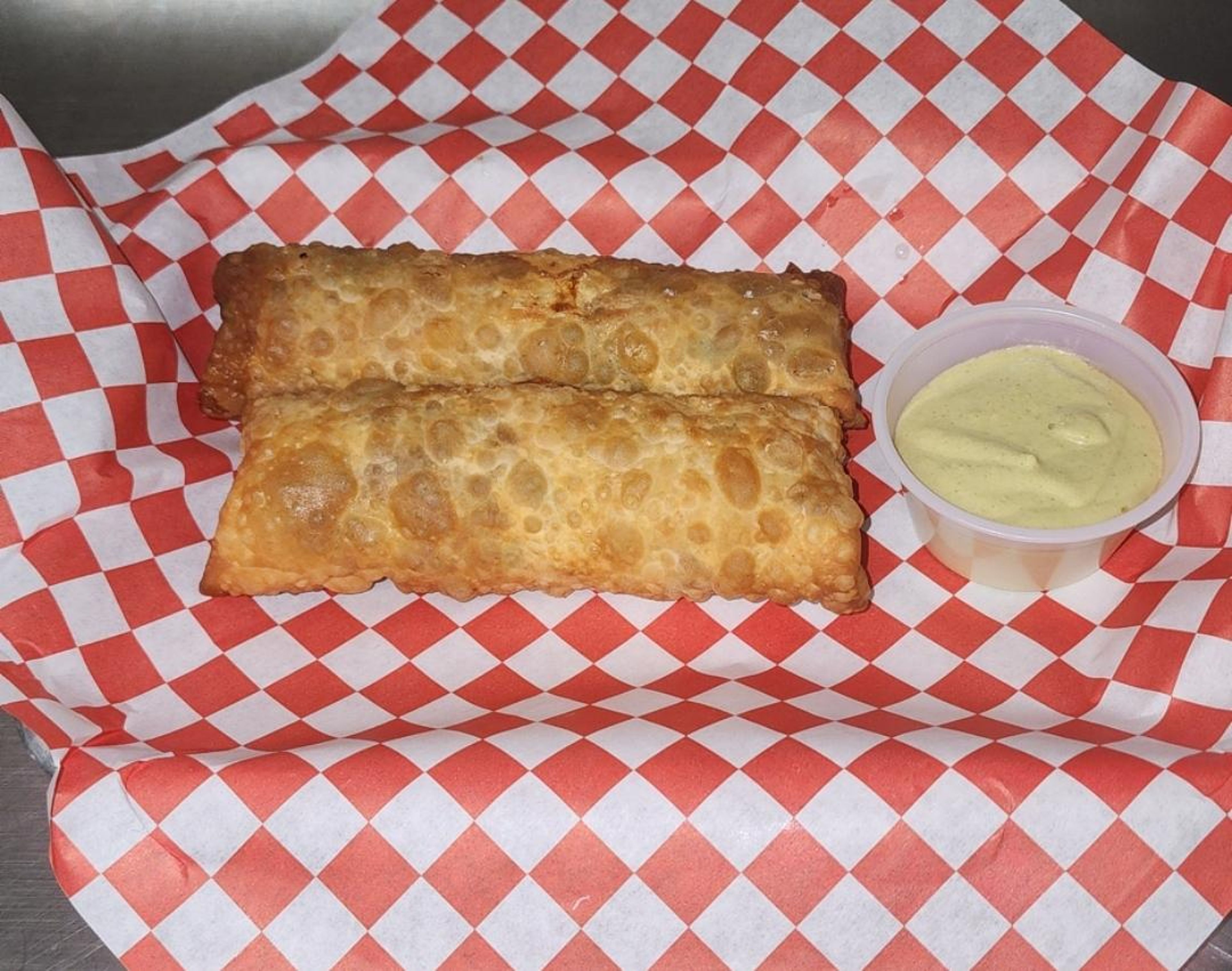 2 chicken buffalo, yellow cheese  egg rolls.