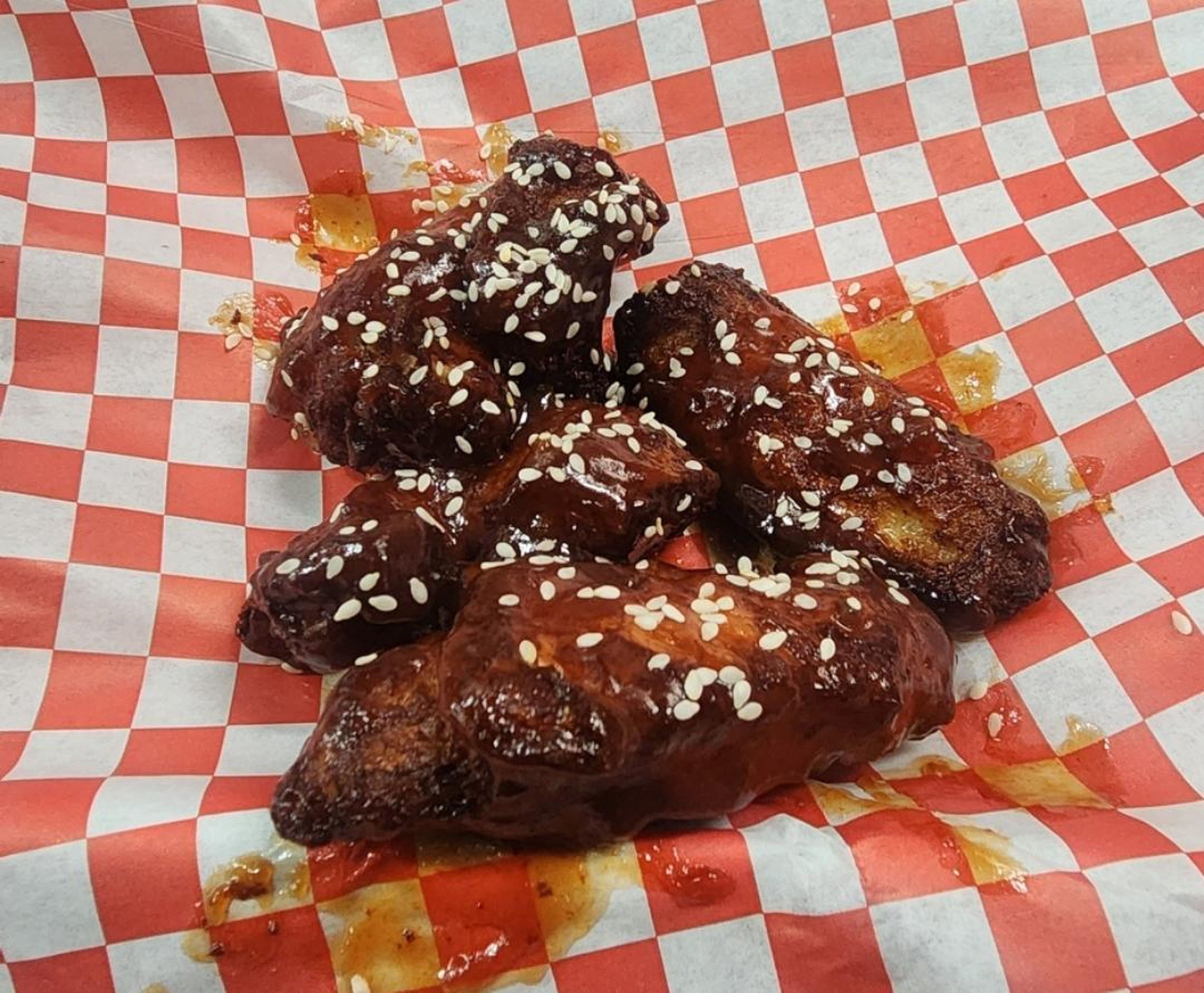 SWEET & SOUR WINGS & sesame seeds.