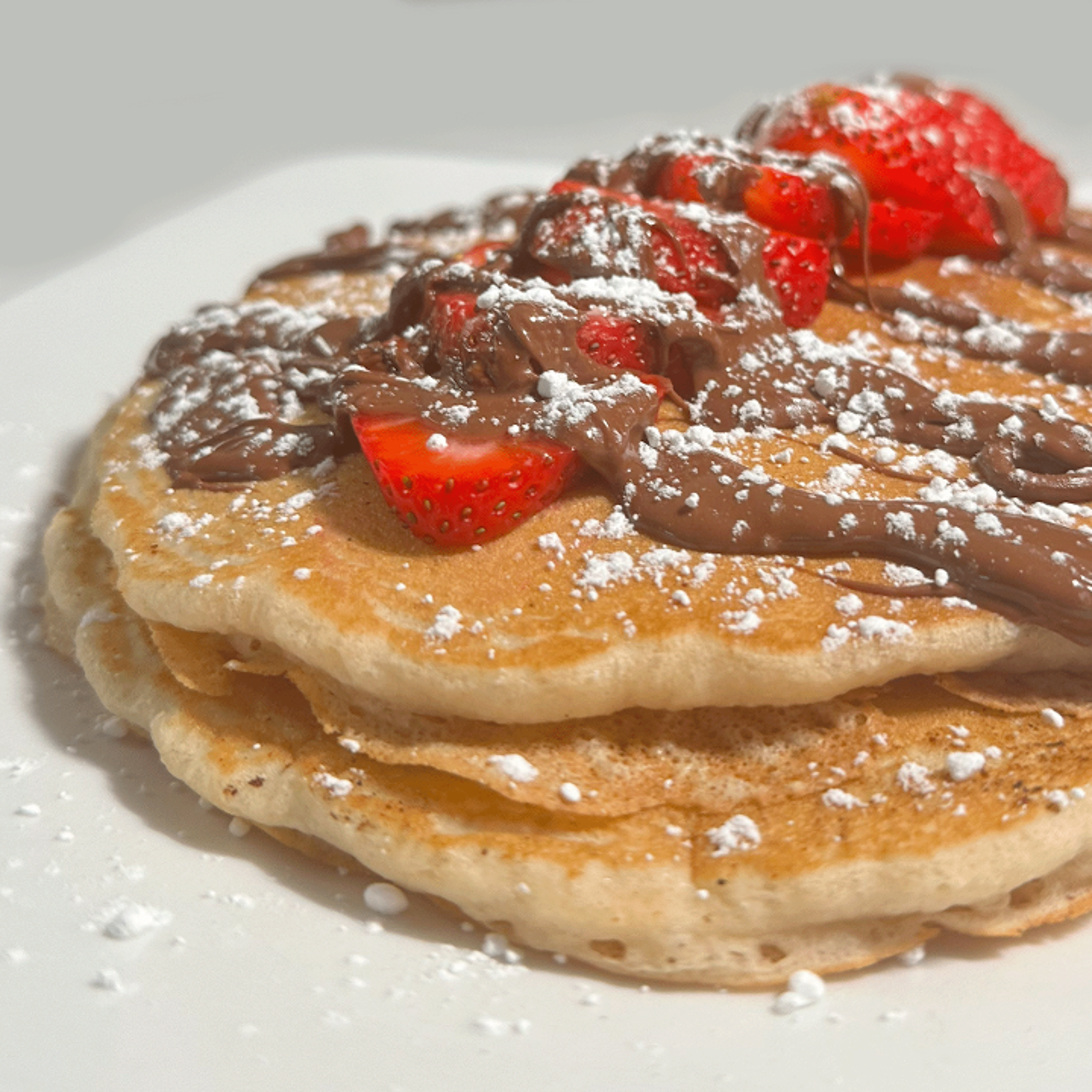 STRAWBERRY NUTELLA PANCAKES.