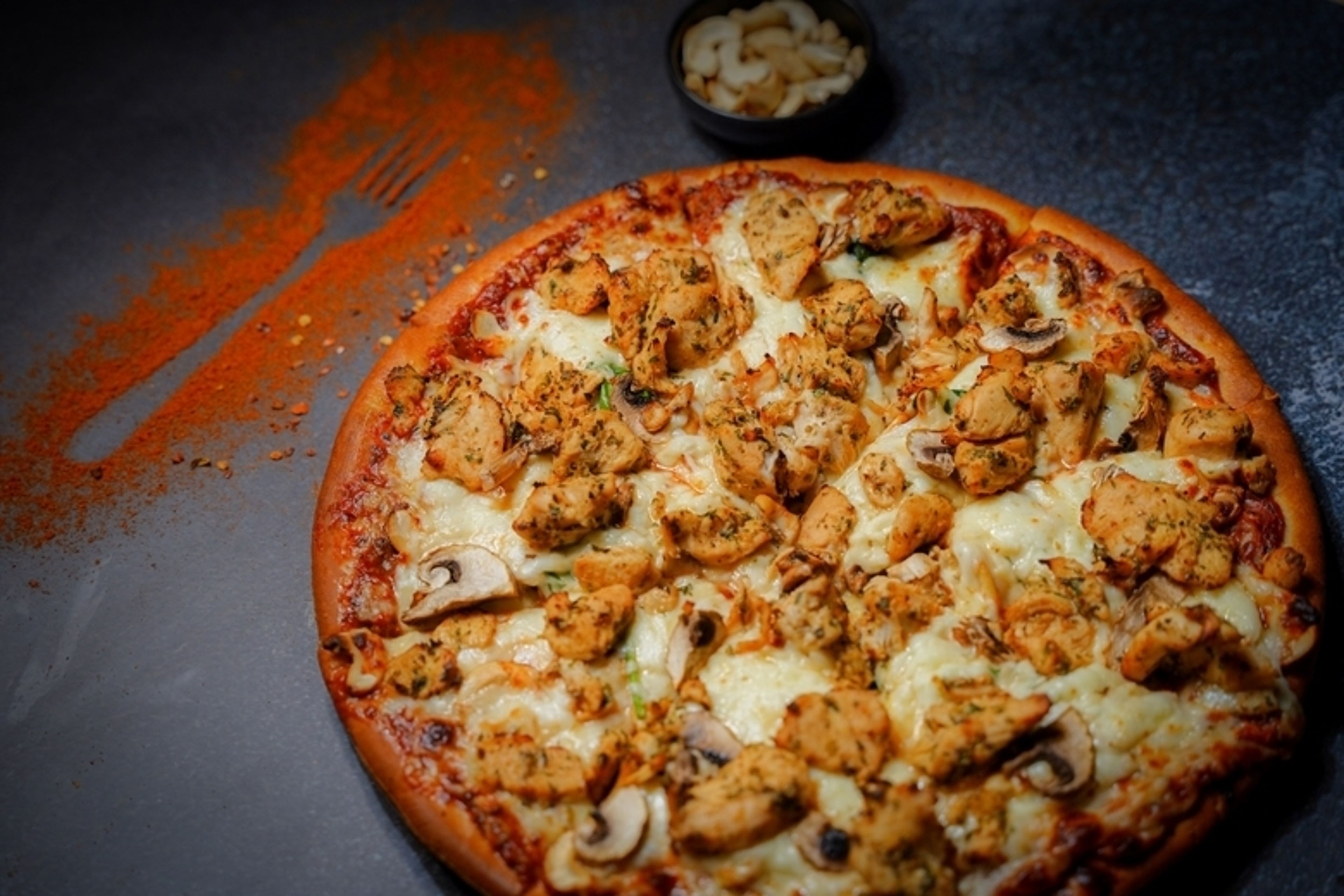 Roasted Cashews & Chicken Pizza.