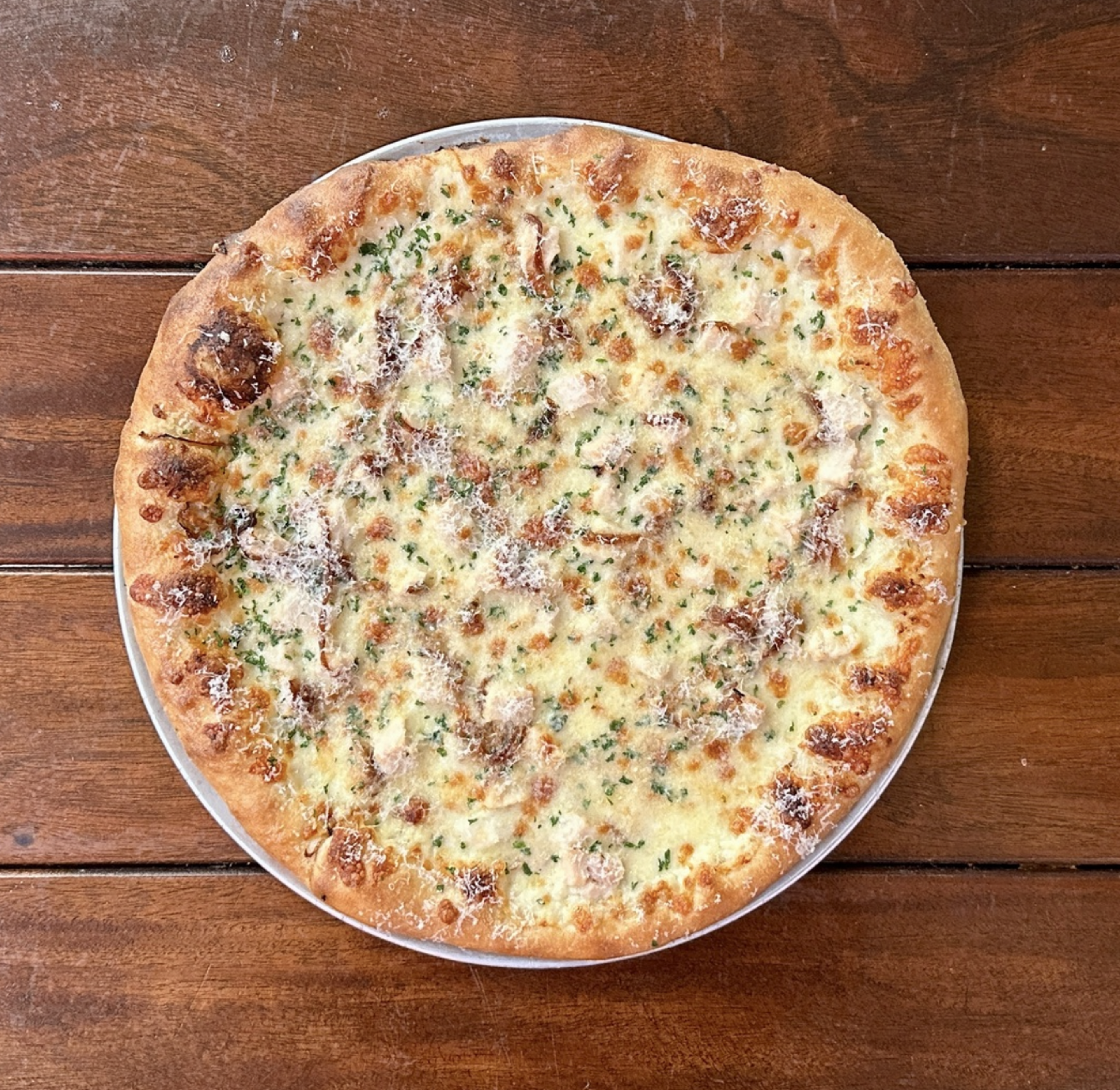 12” Whole Garlic Chicken Pizza.