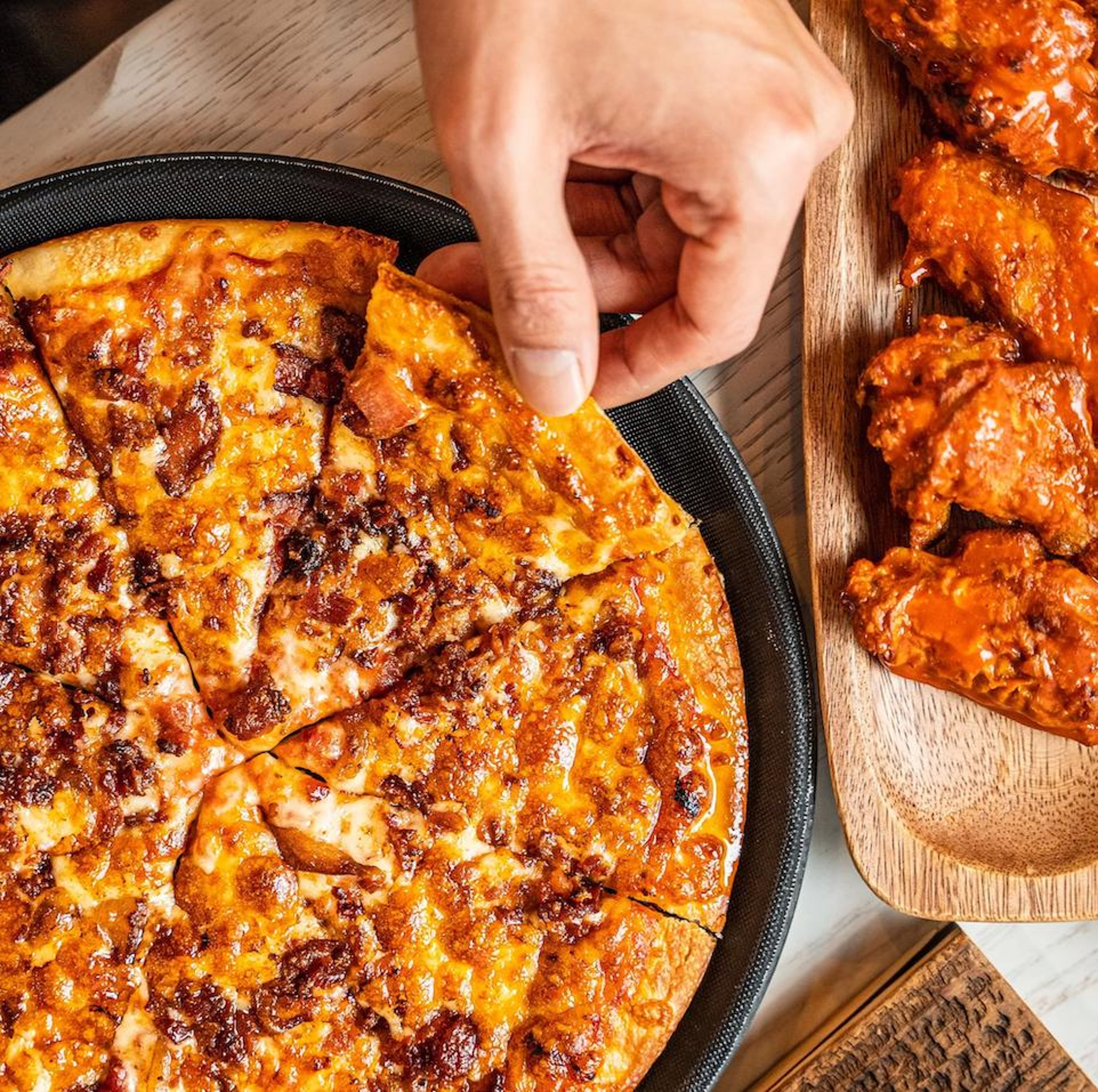 1 Large 14' inch Cheese Pizza and 7 Wings (Pick up only).