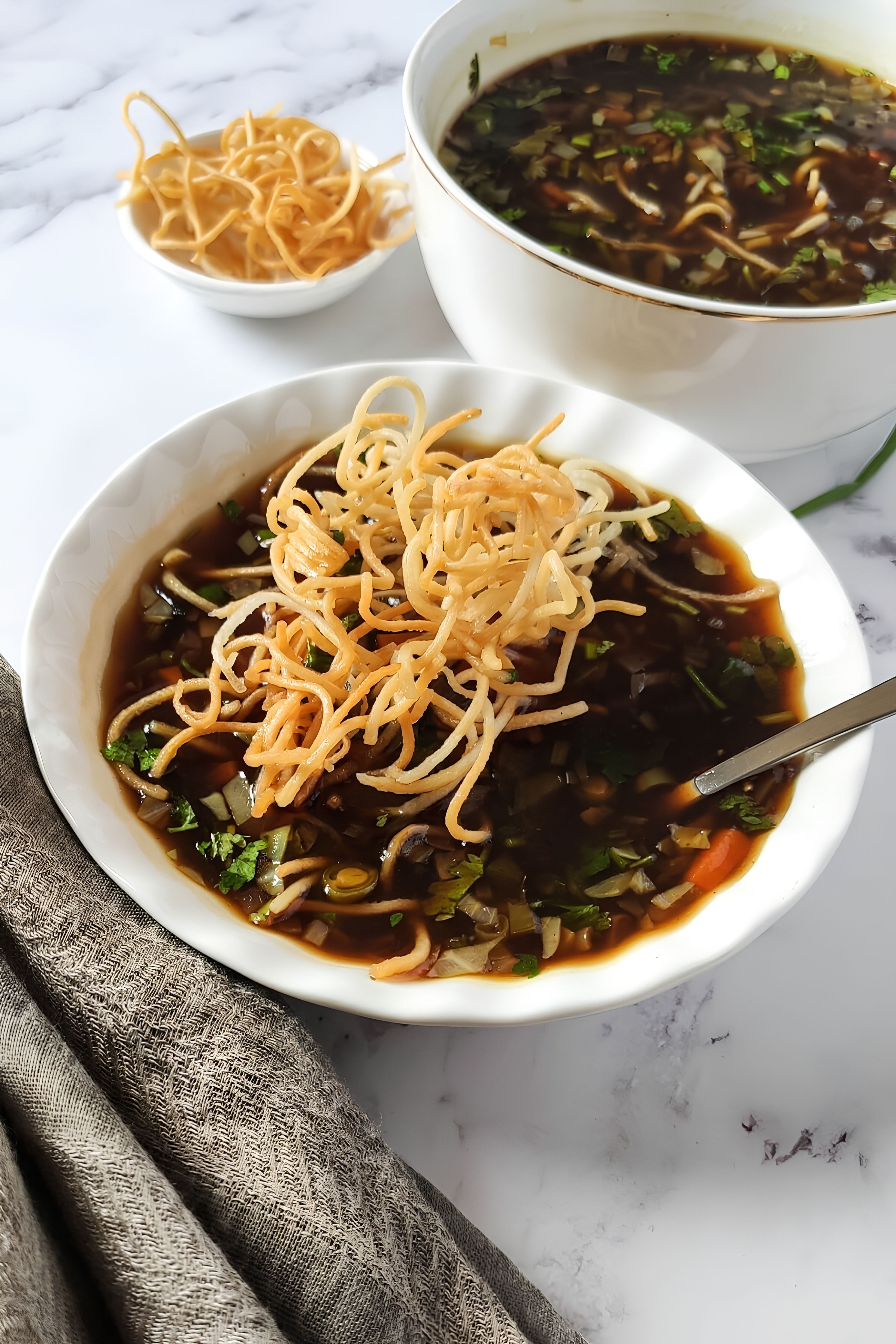 Veg Manchow Soup + Noodles (16oz).