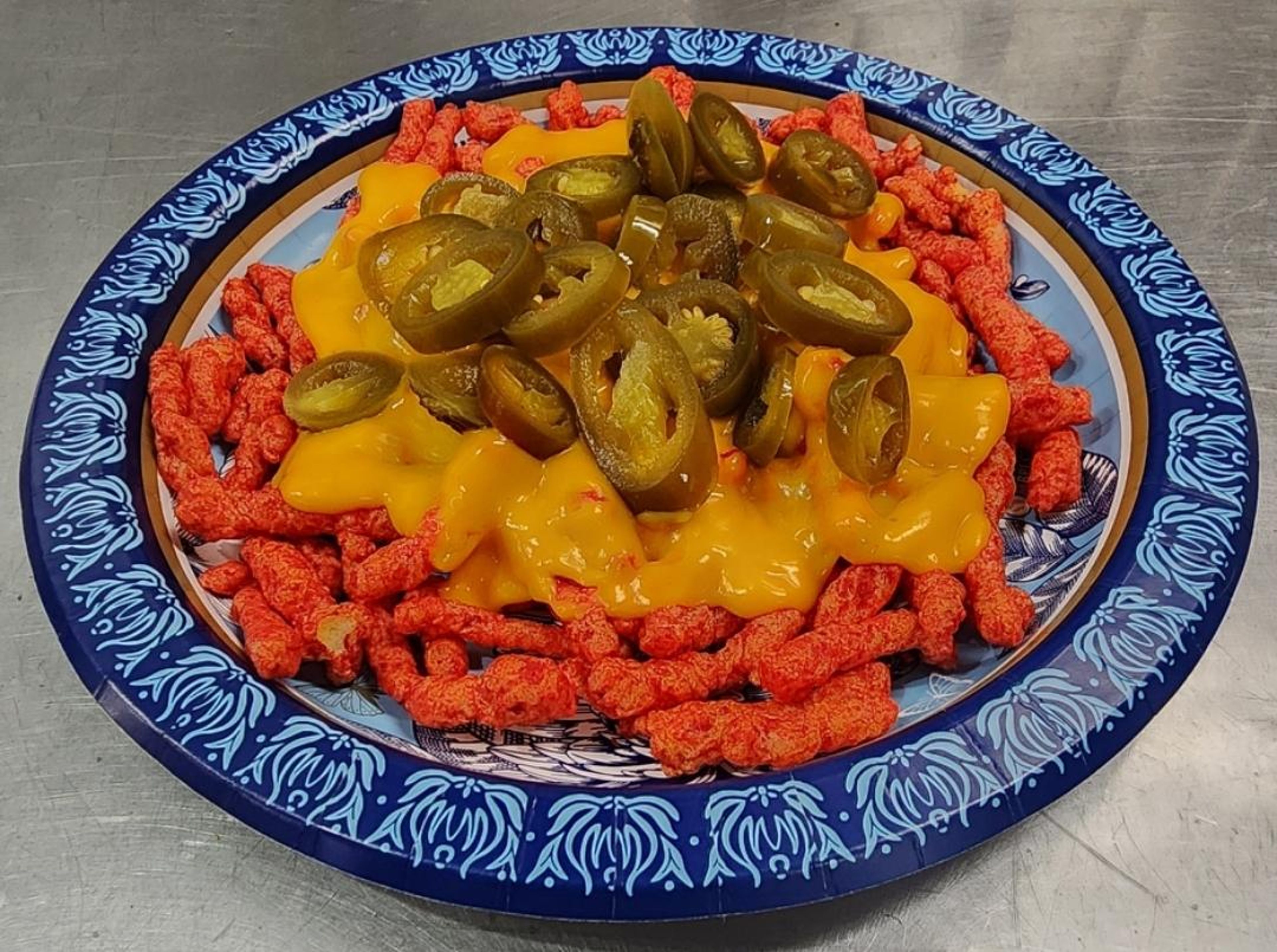 NACHO CHEESE, HOT CHEETOS & JALAPEÑOS.