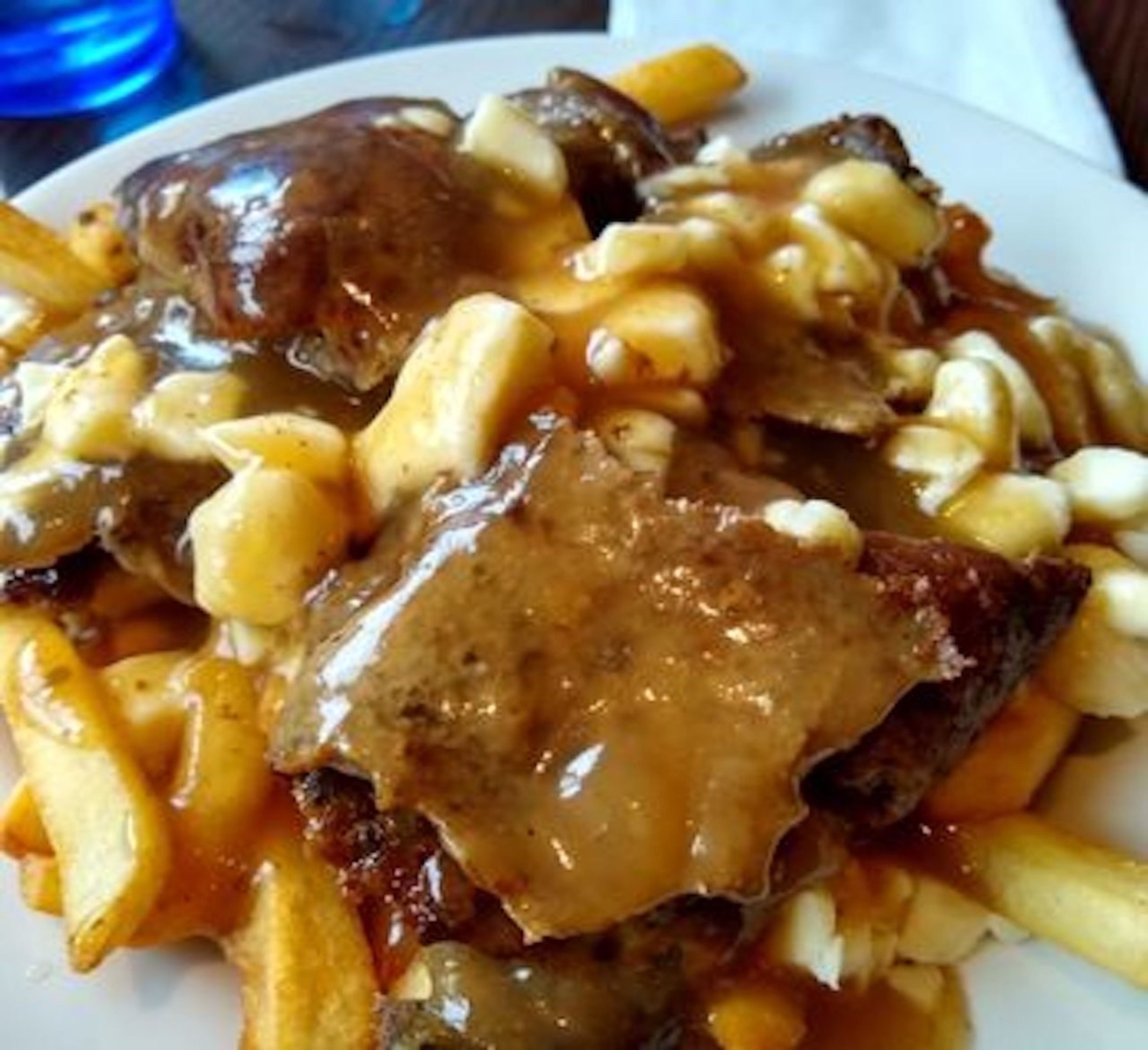 GREEK GUYS POUTINE (topped w/ chicken gyro meat).