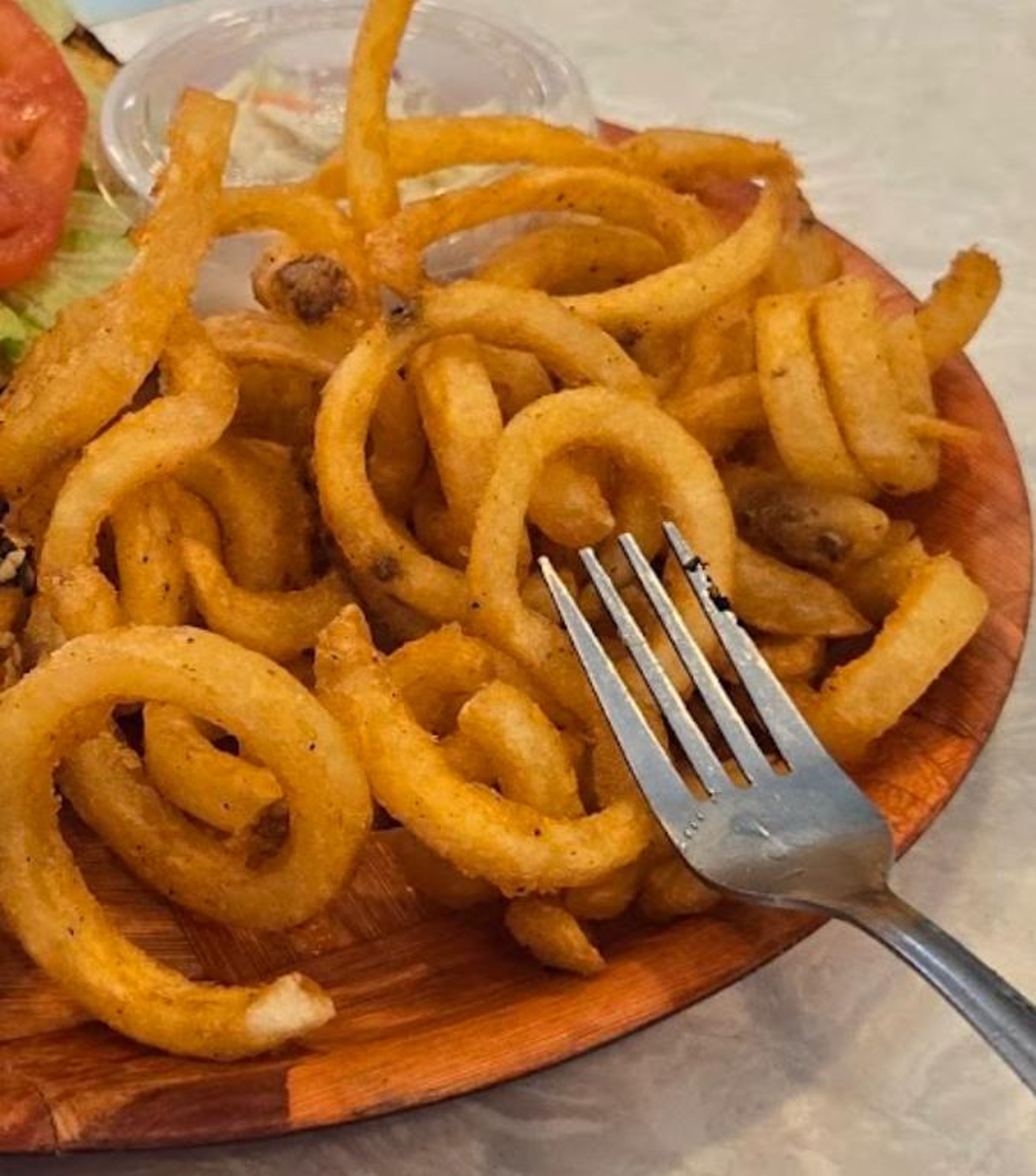 Tarks seasoned Curly Fries (1/2 Lb).