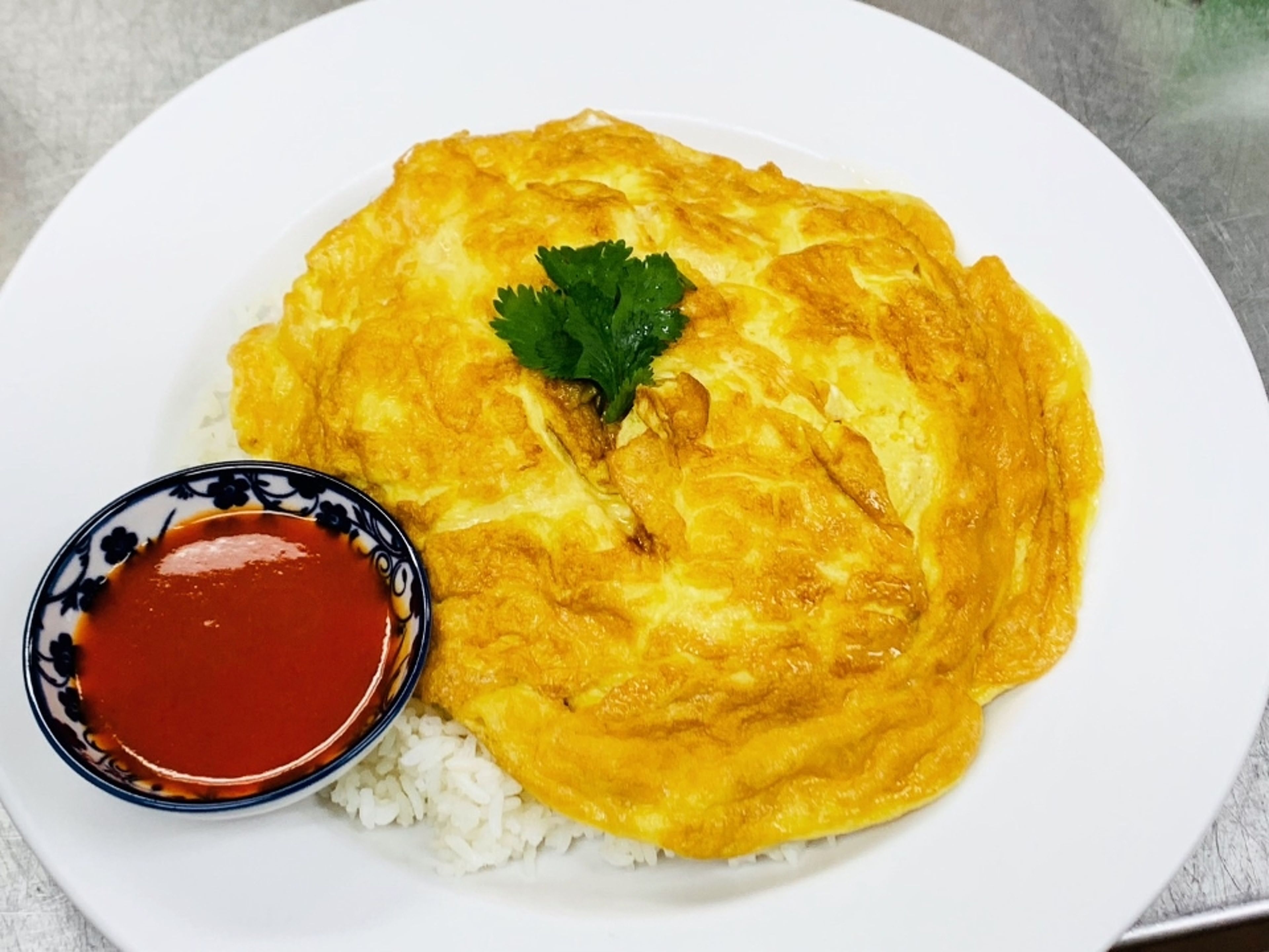 Thai Omelet Over Rice.