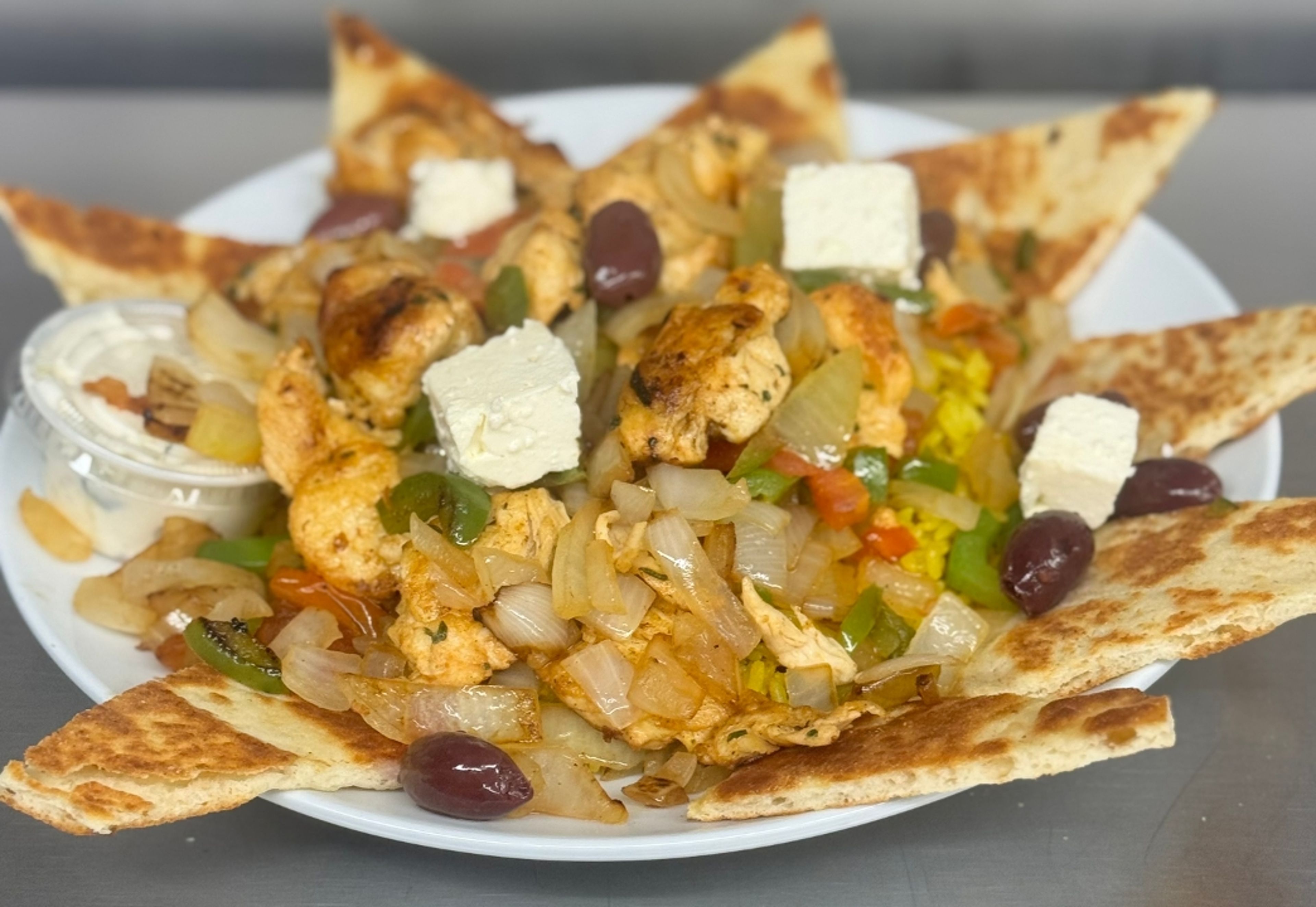 Chicken Souvlaki Over Rice.