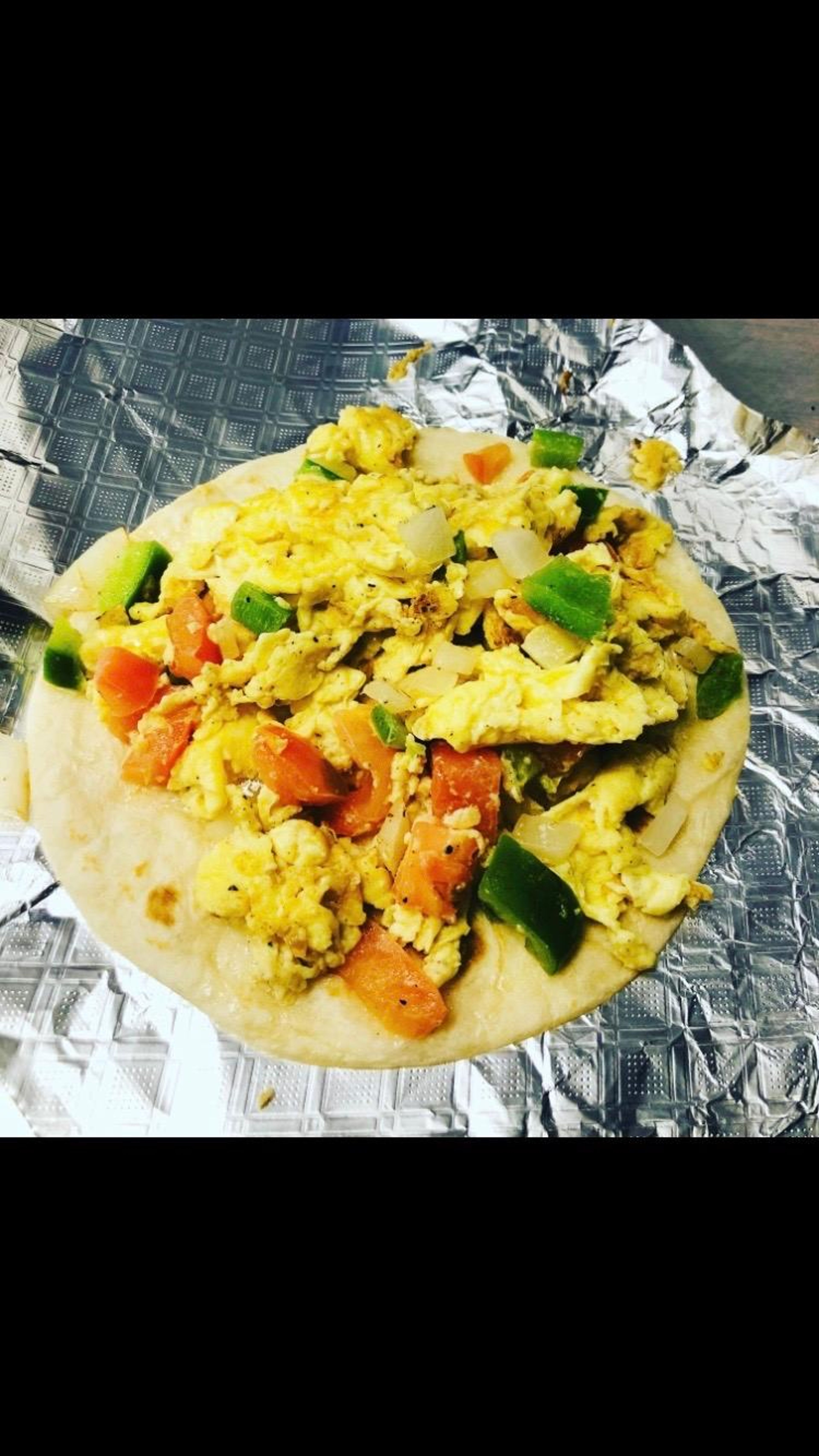 Mexican Style: Eggs, Onion, Tomatoes, & Bell Peppers.