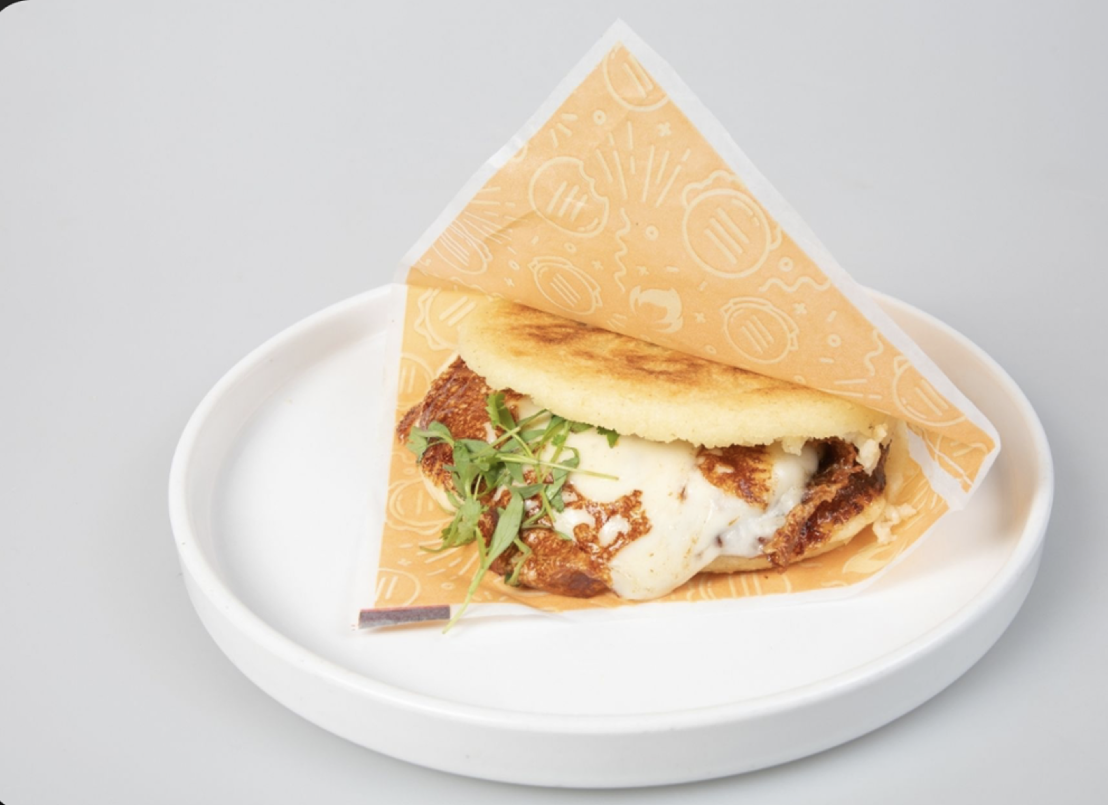 Arepa with grilled white cheese.
