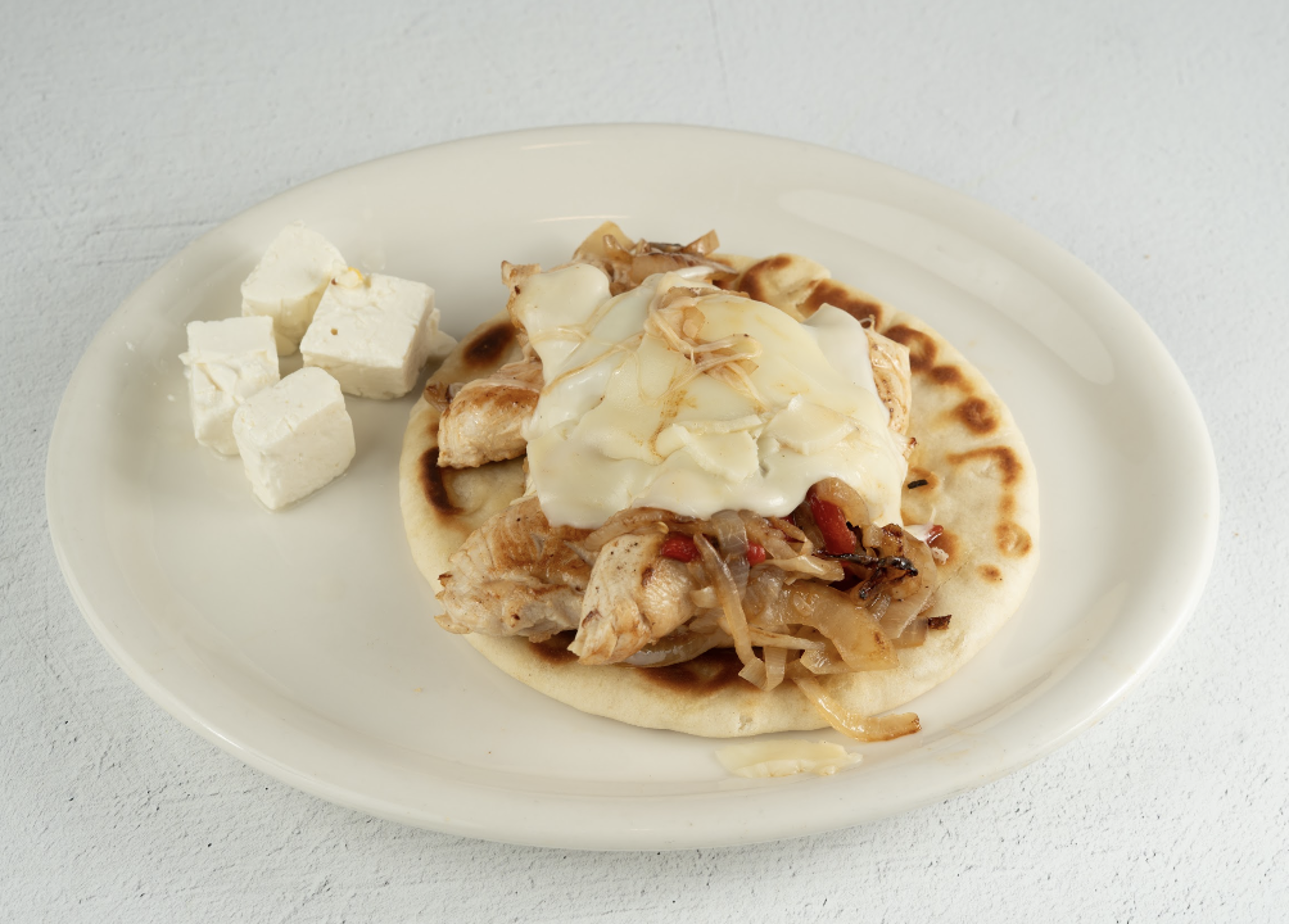 Greek Chicken on Pita.