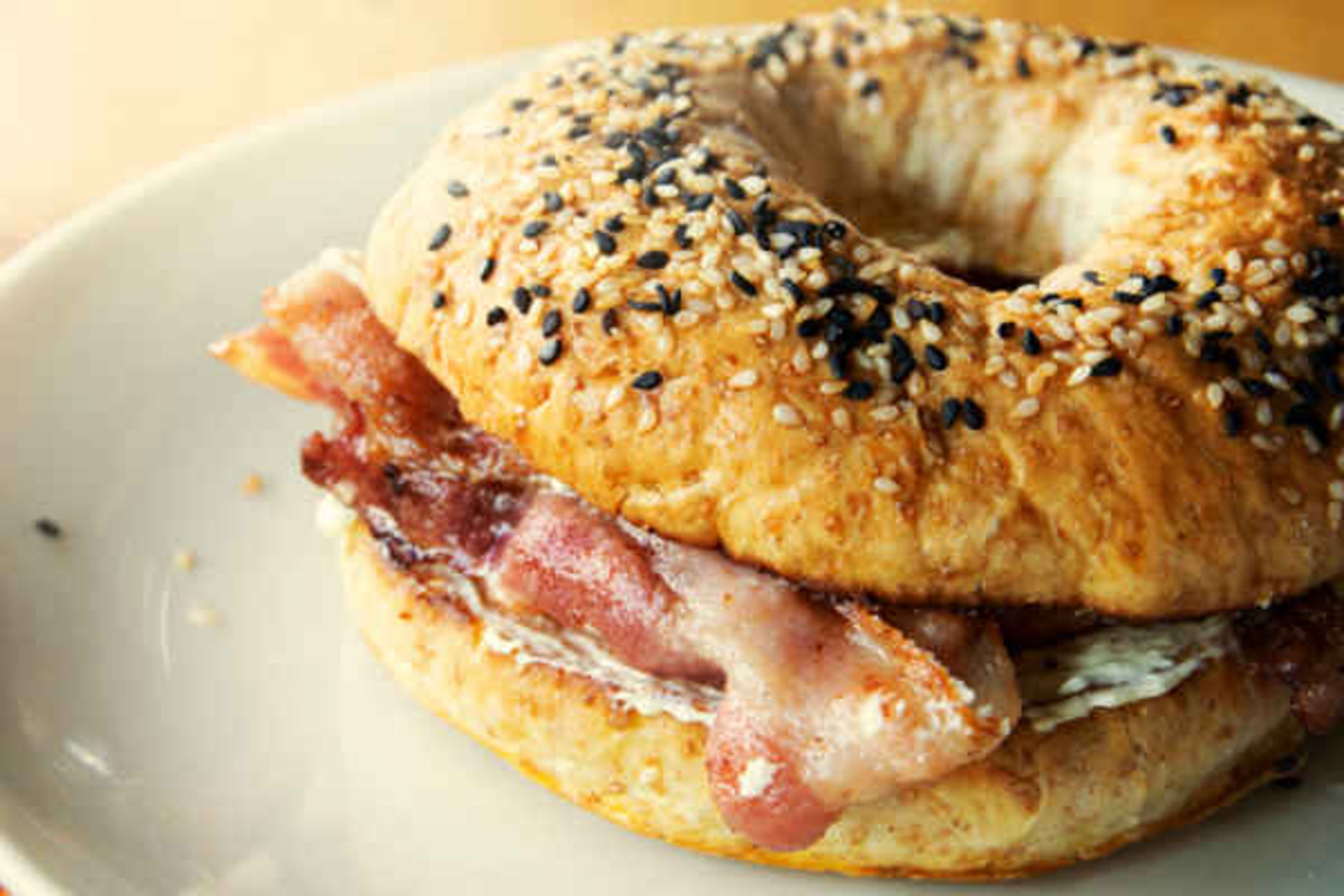 BAGLE W/ CREAM CHEESE & BEEF BACON.