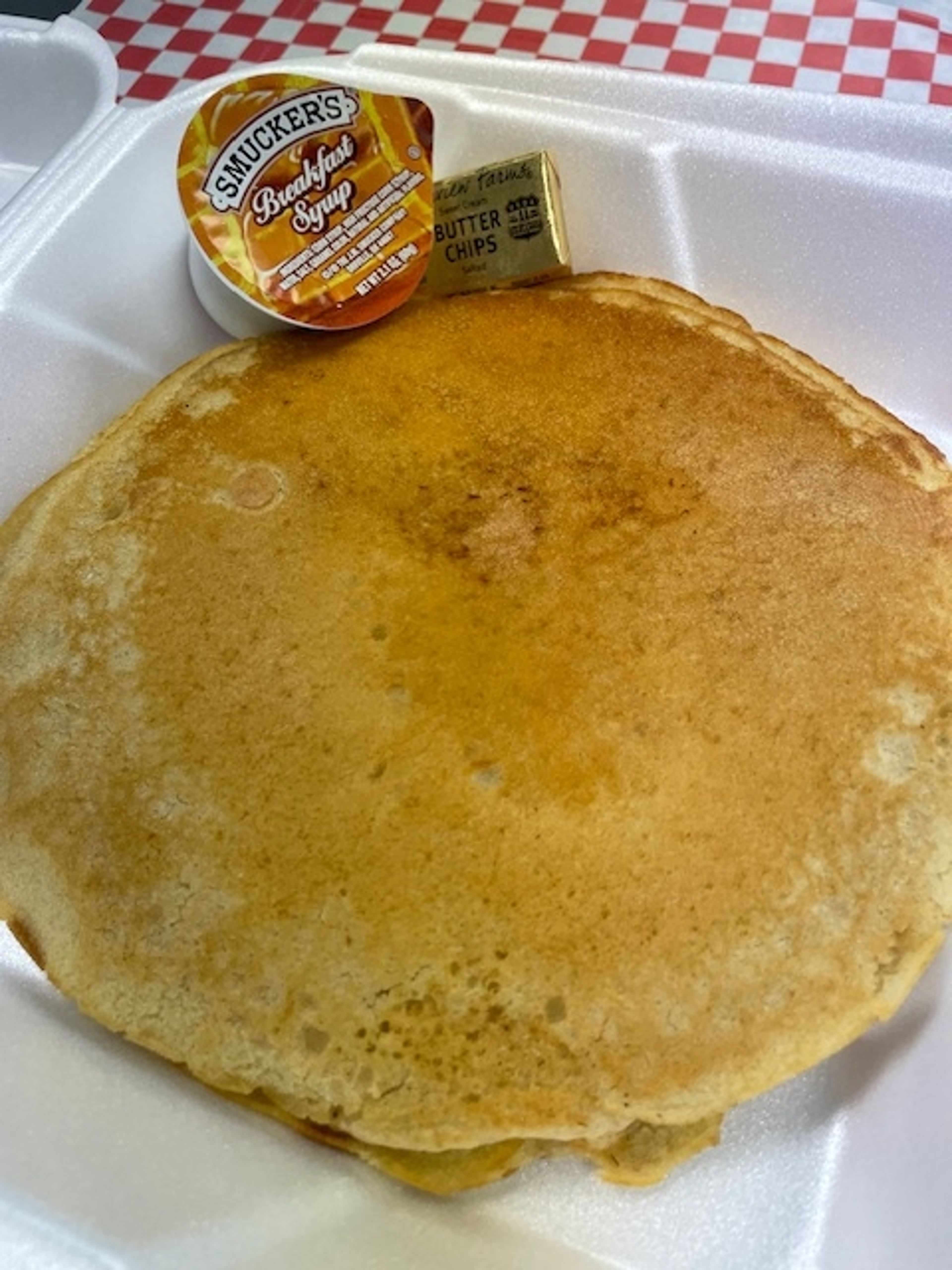 Three Pancakes and Syrup.