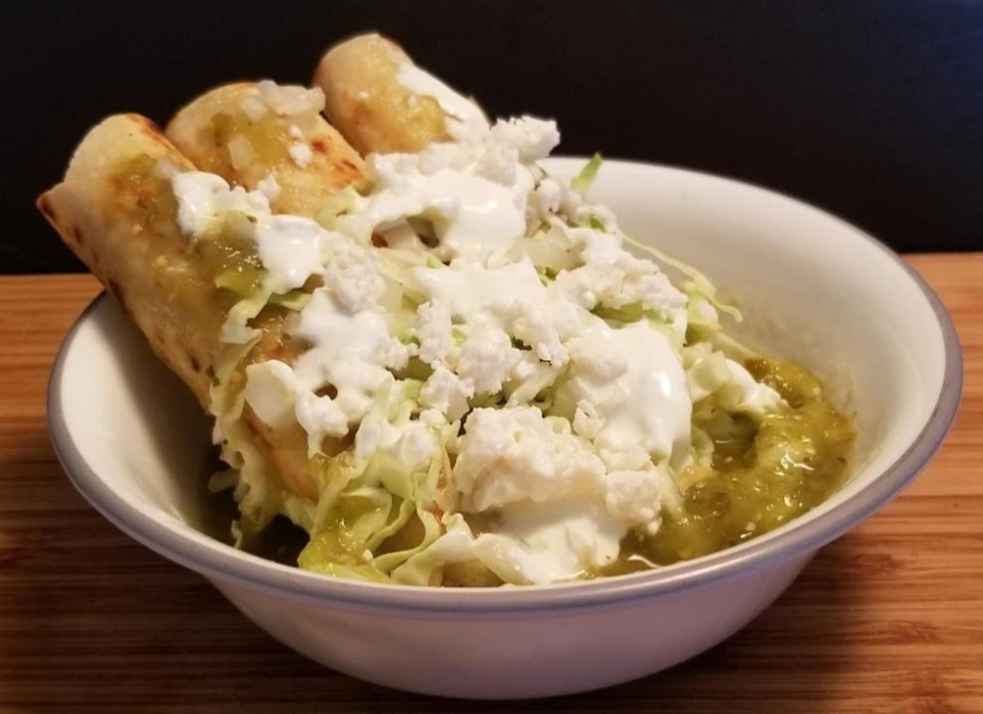  3 TAQUITOS AHOGADO  3 DROWNED TAQUITOS RICE & BEANS.