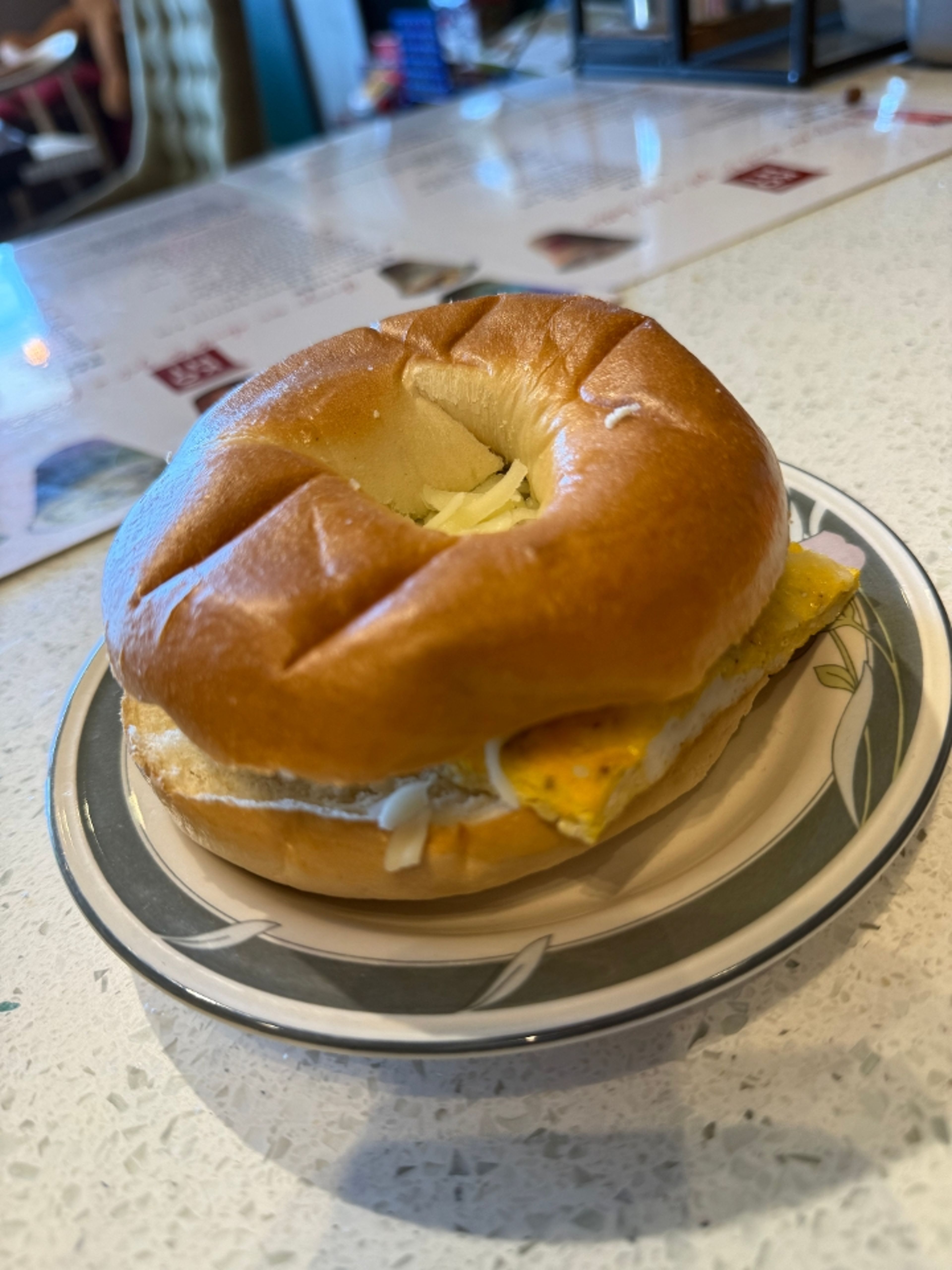 SAUSAGE EGG CHEESE BAGEL.