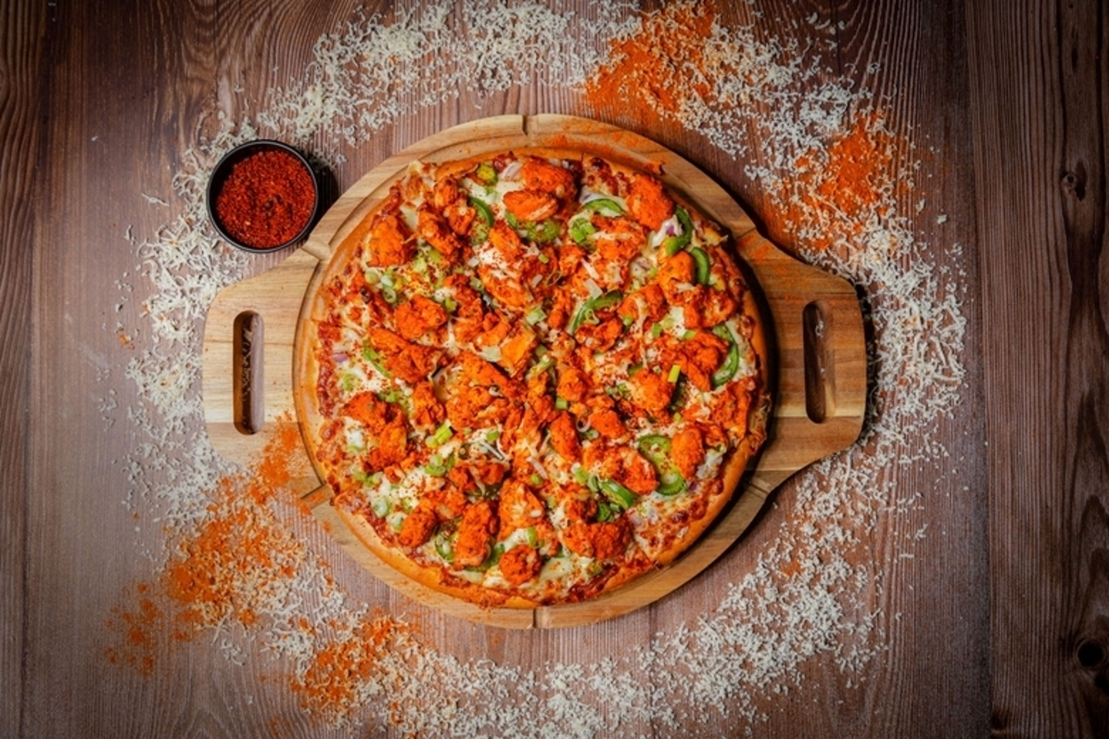 Achari Tandoori Chicken Pizza.