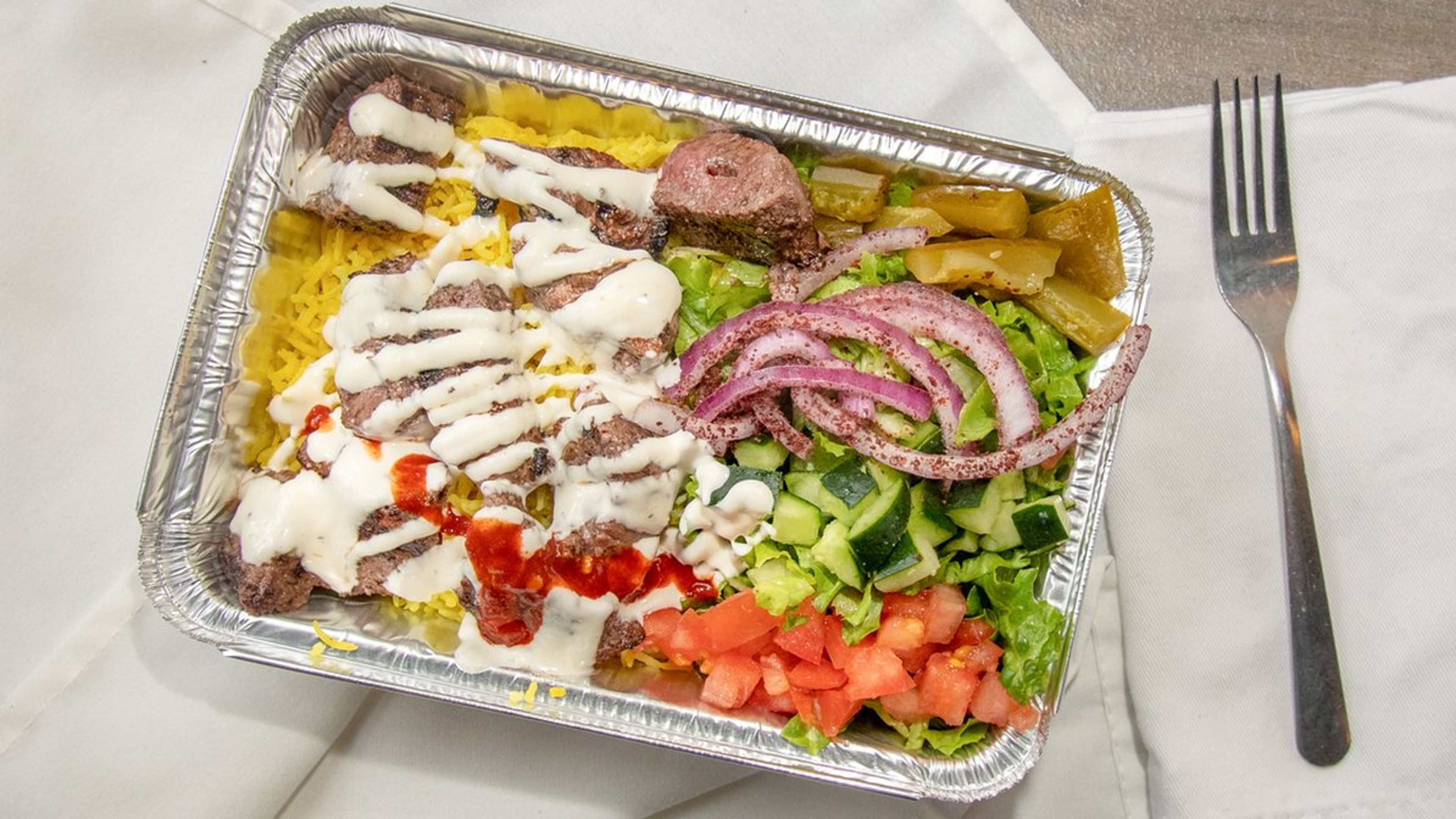 Lamb Kebab Over Rice.