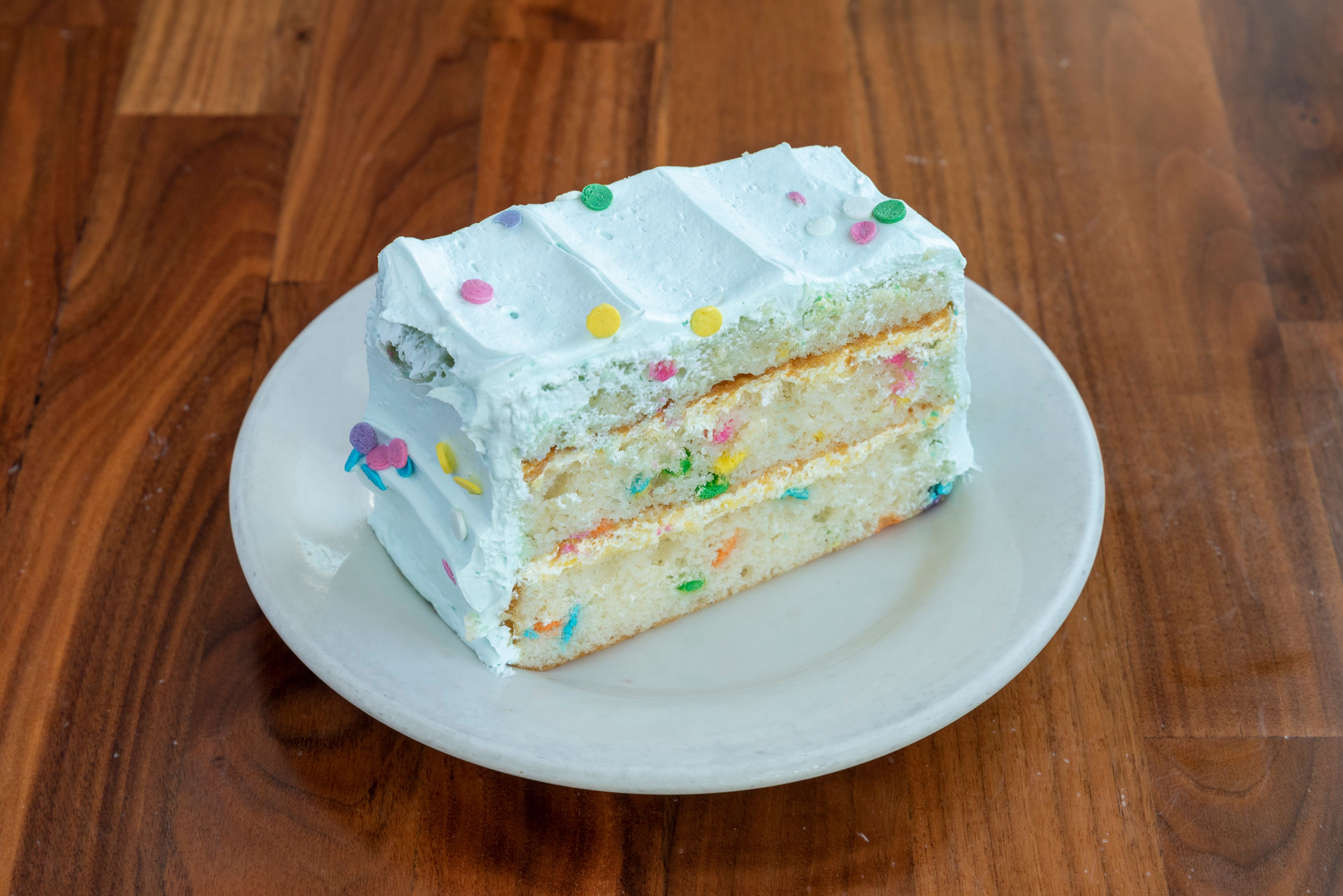 Celebration Cake (white), slice.