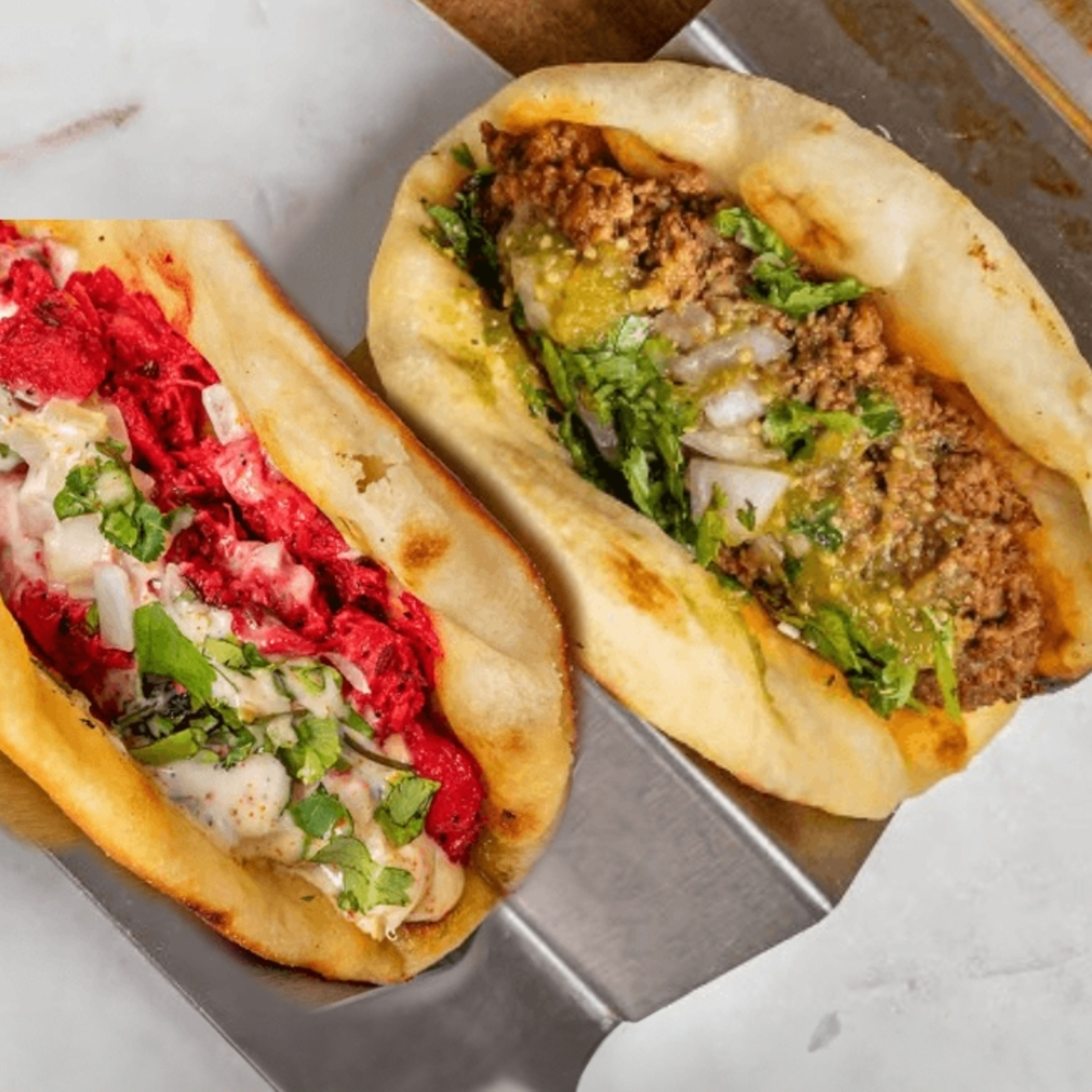 Chipotle Keema Taco & Lemon Chilli Chicken Taco.