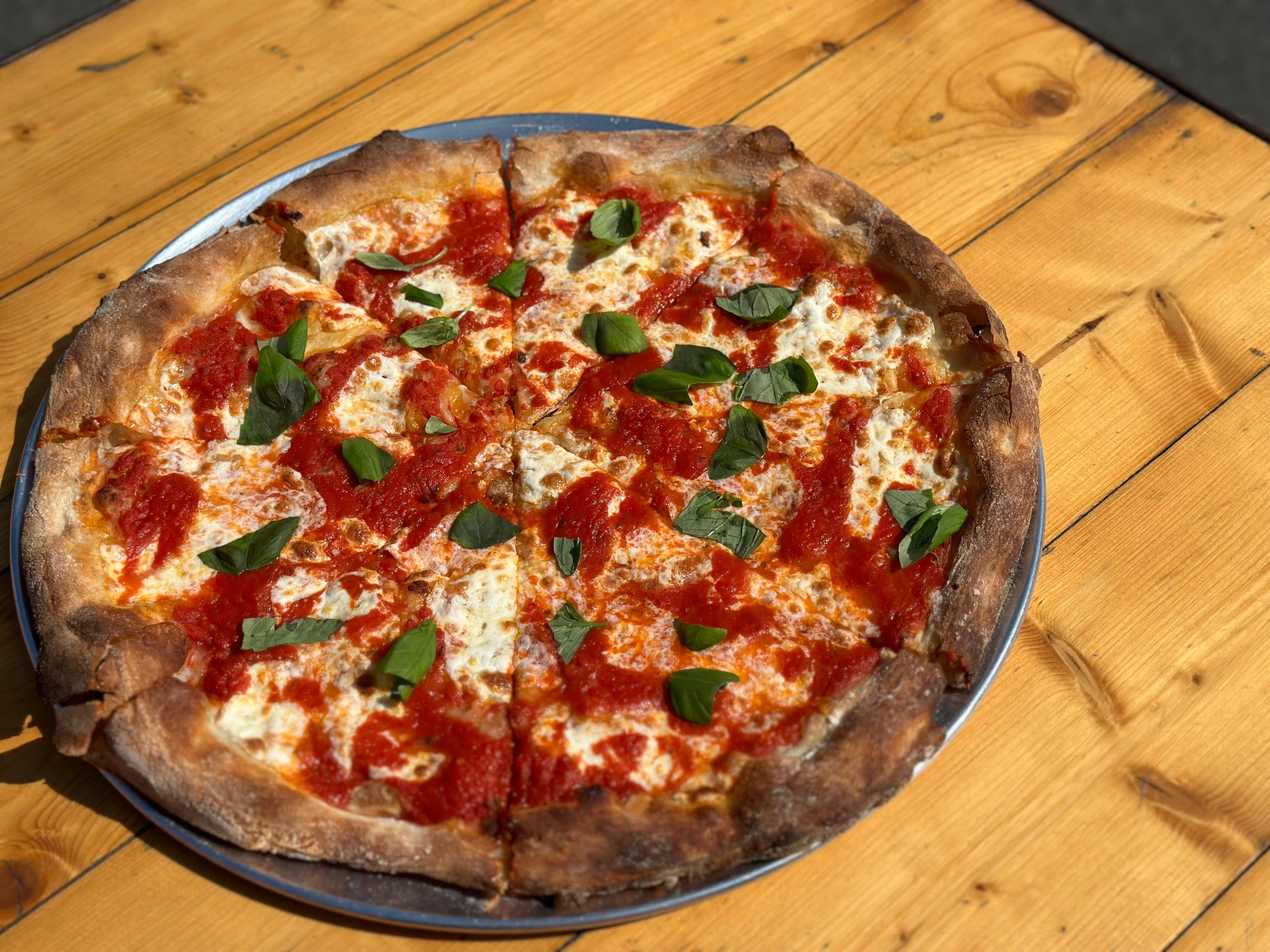 Round Margherita Pizza.