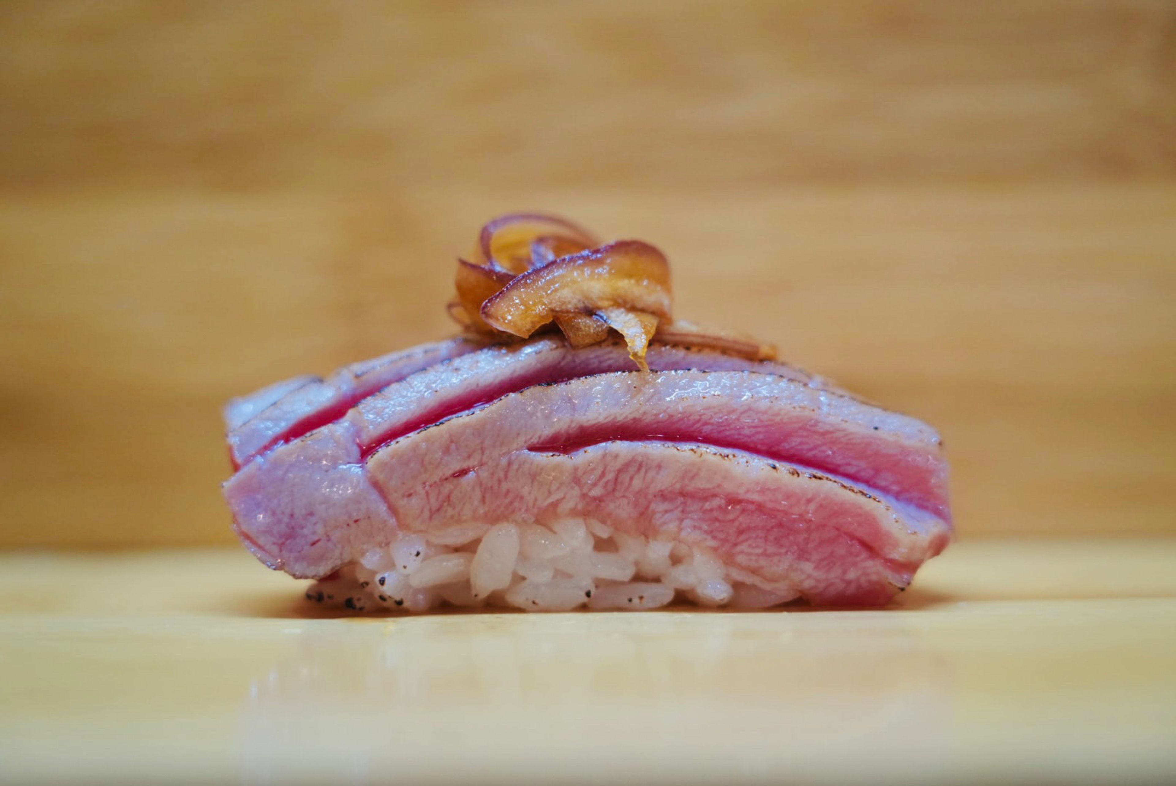 Seared Toro Carpaccio Sushi.