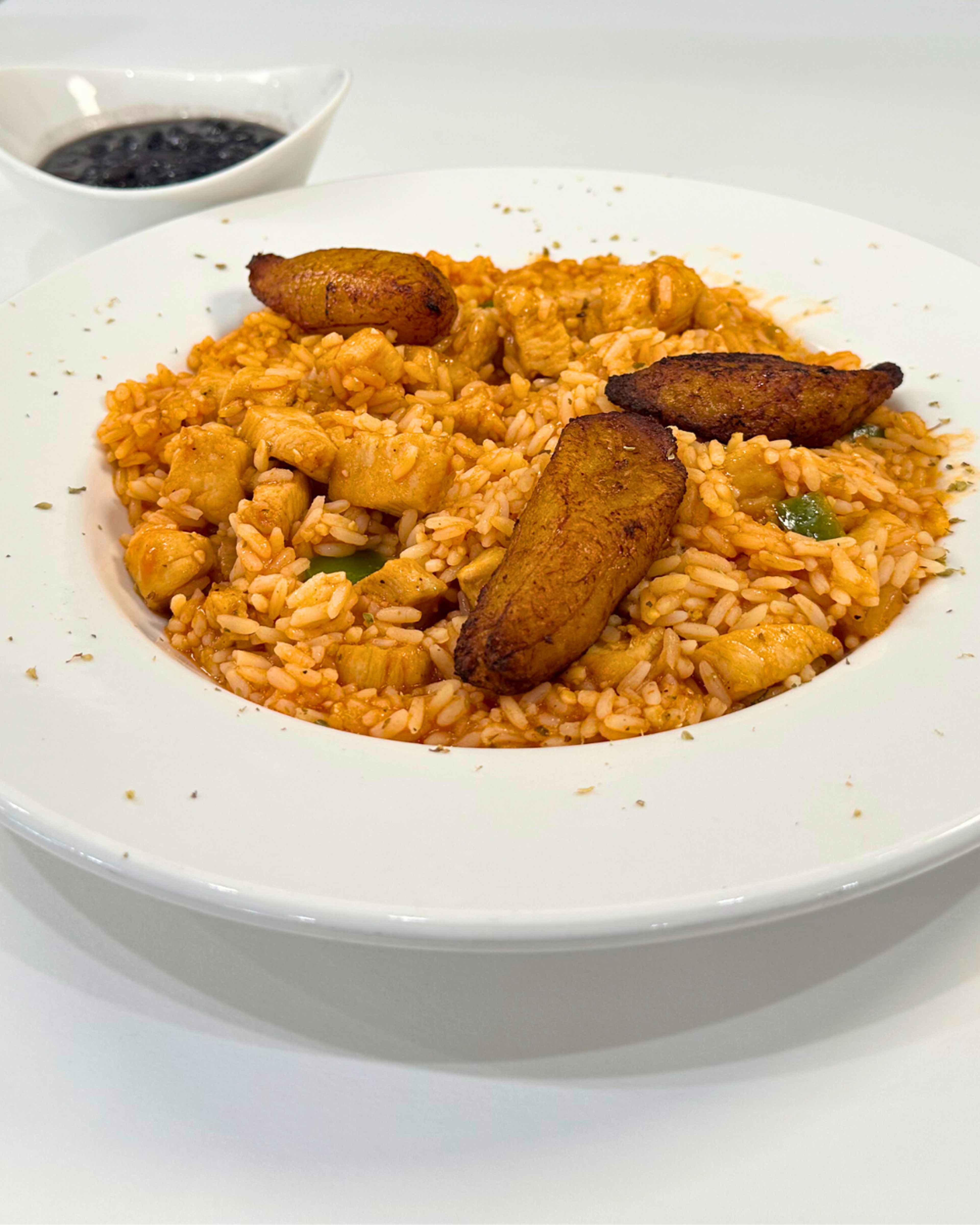 $ ARROZ CON POLLO.
