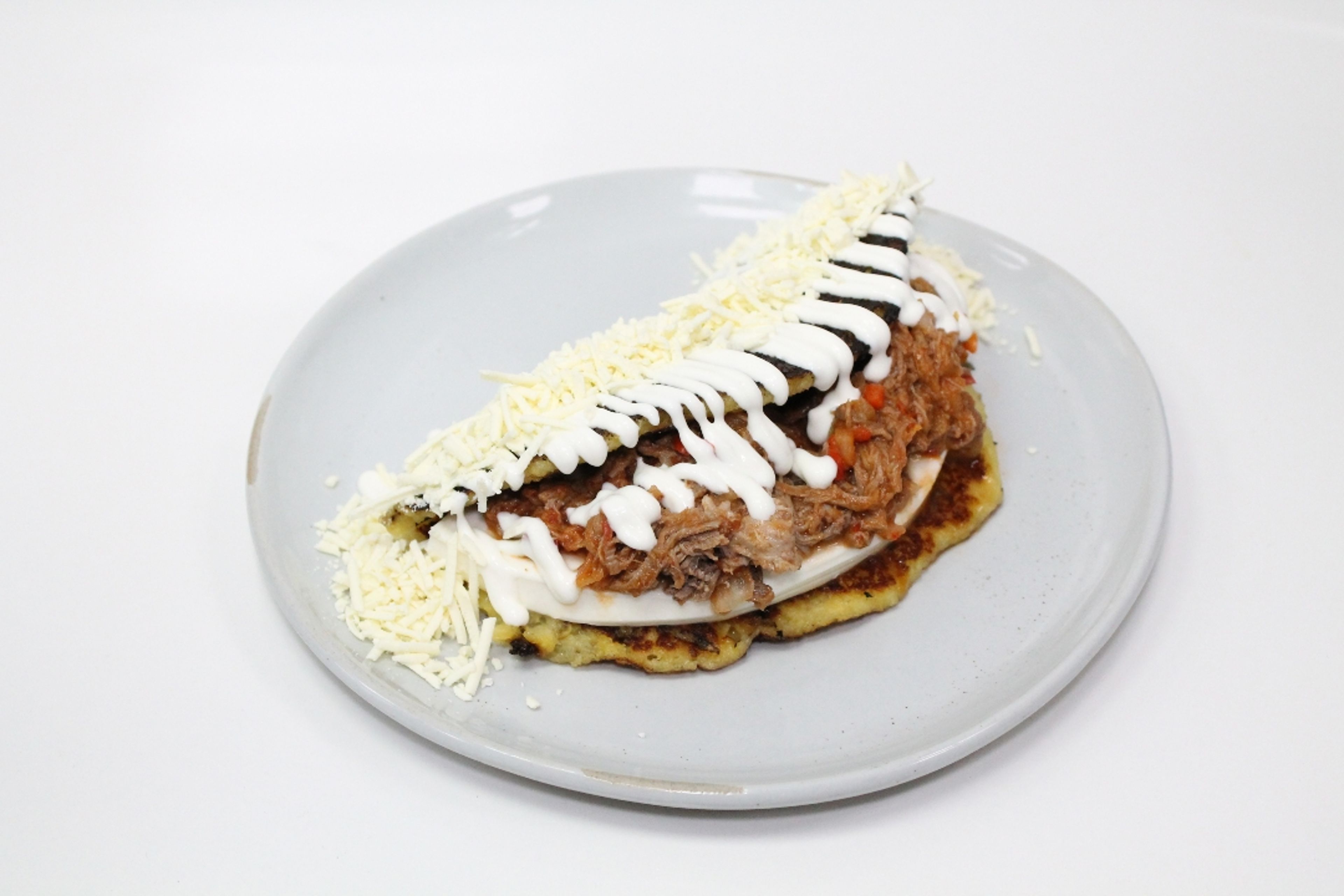 Cachapa Con Carne Mechada.