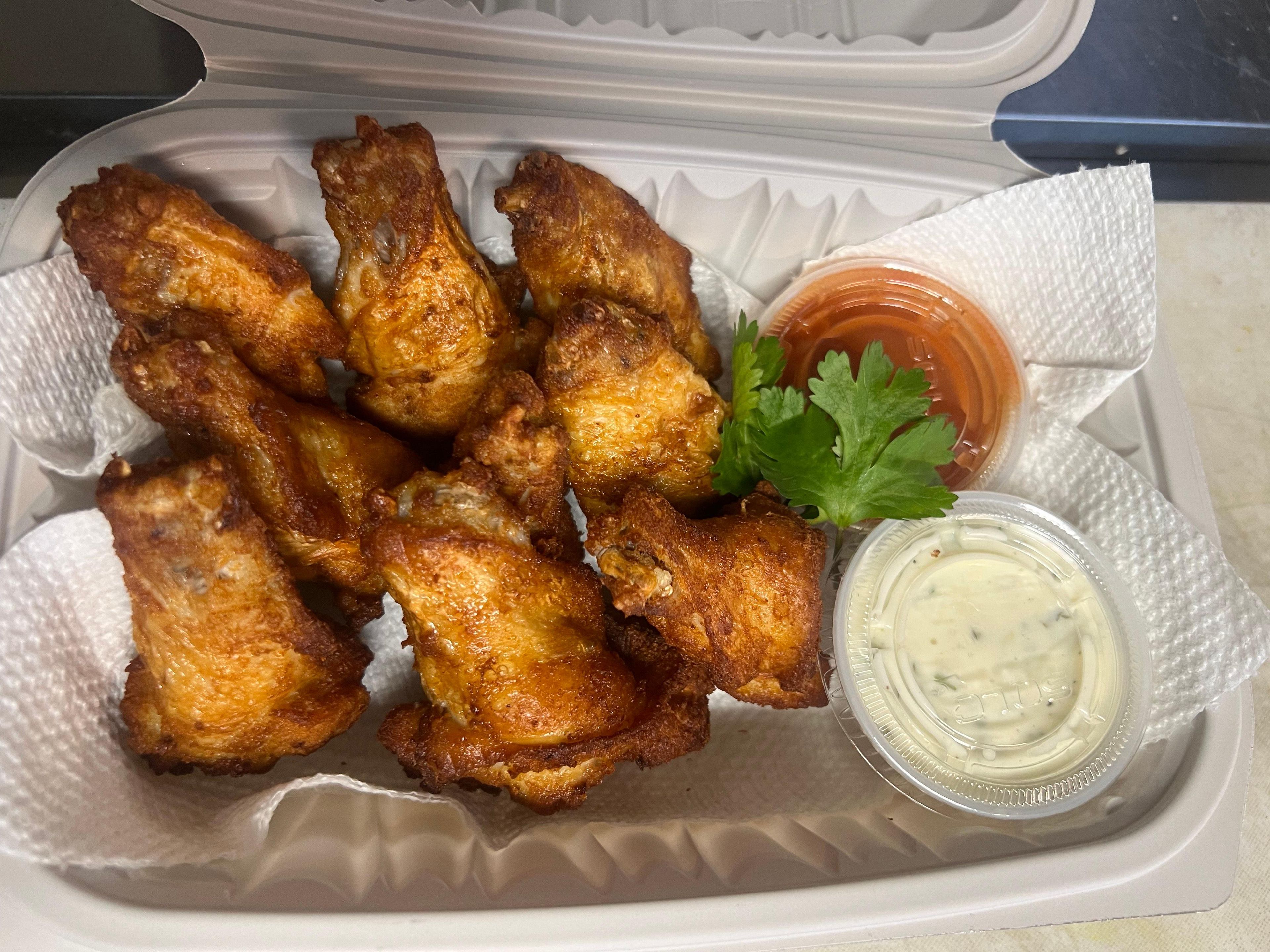 BUFFALO WINGS WITH RANCH/HOT FRUNKS.