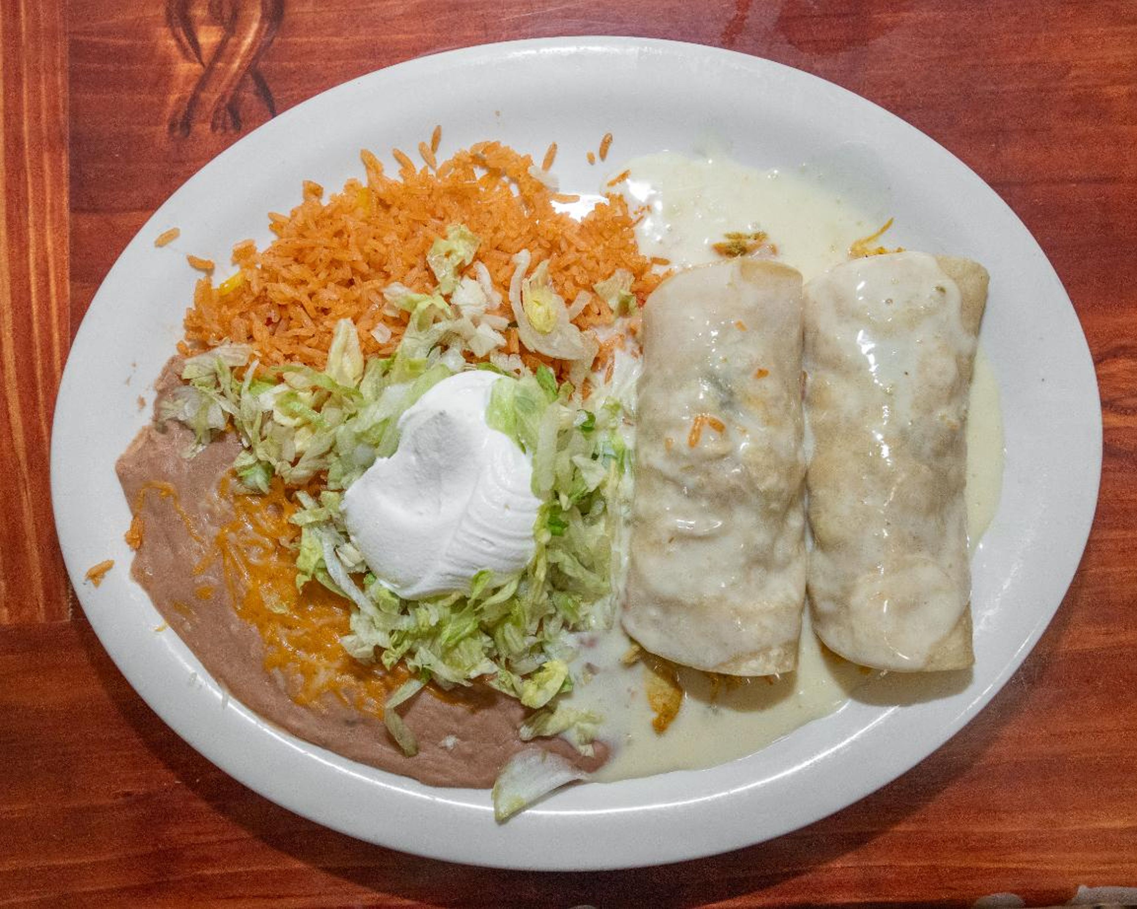 L Cheese Sauce Enchiladas.