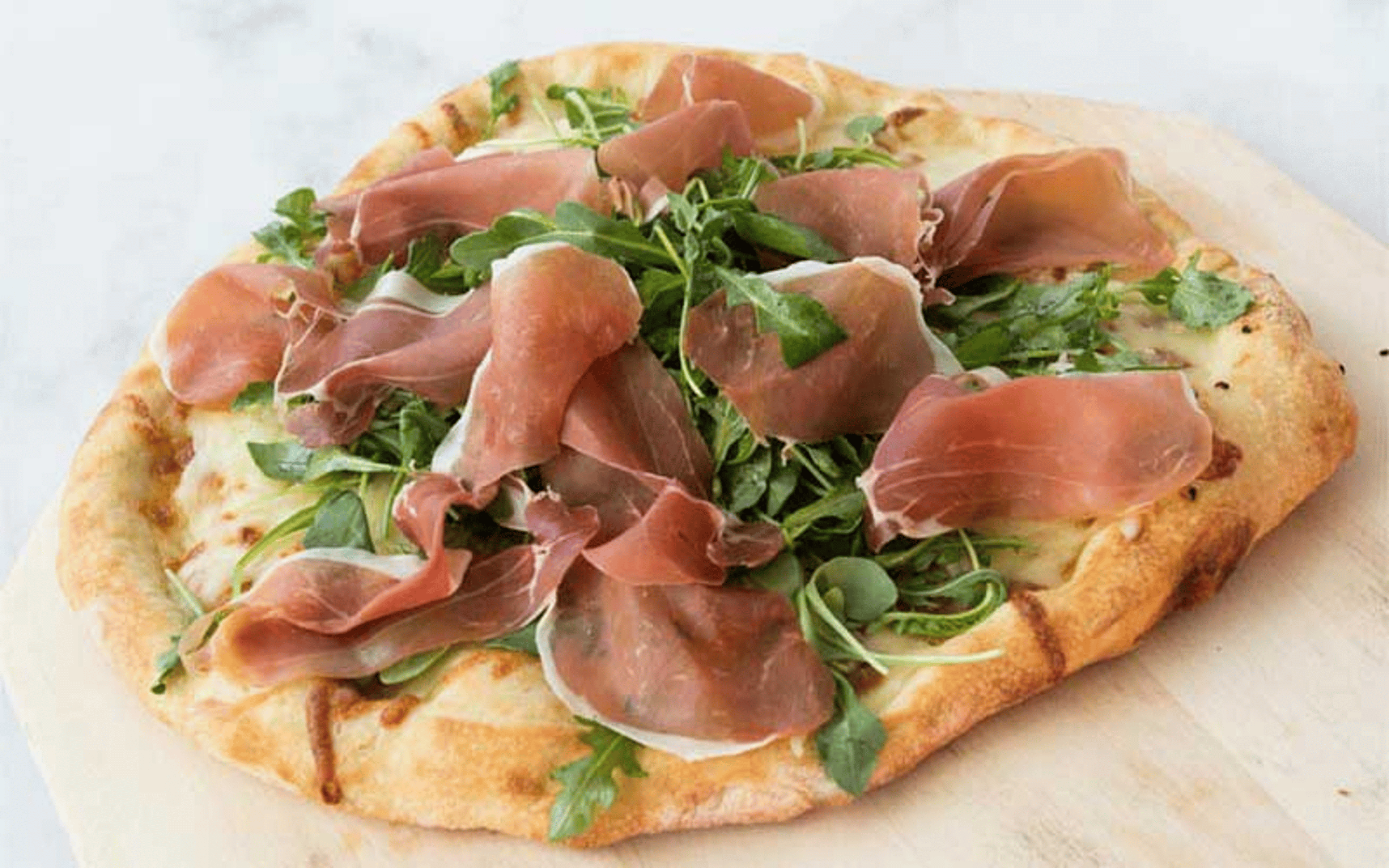 Prosciutto & Arugula Pizza.