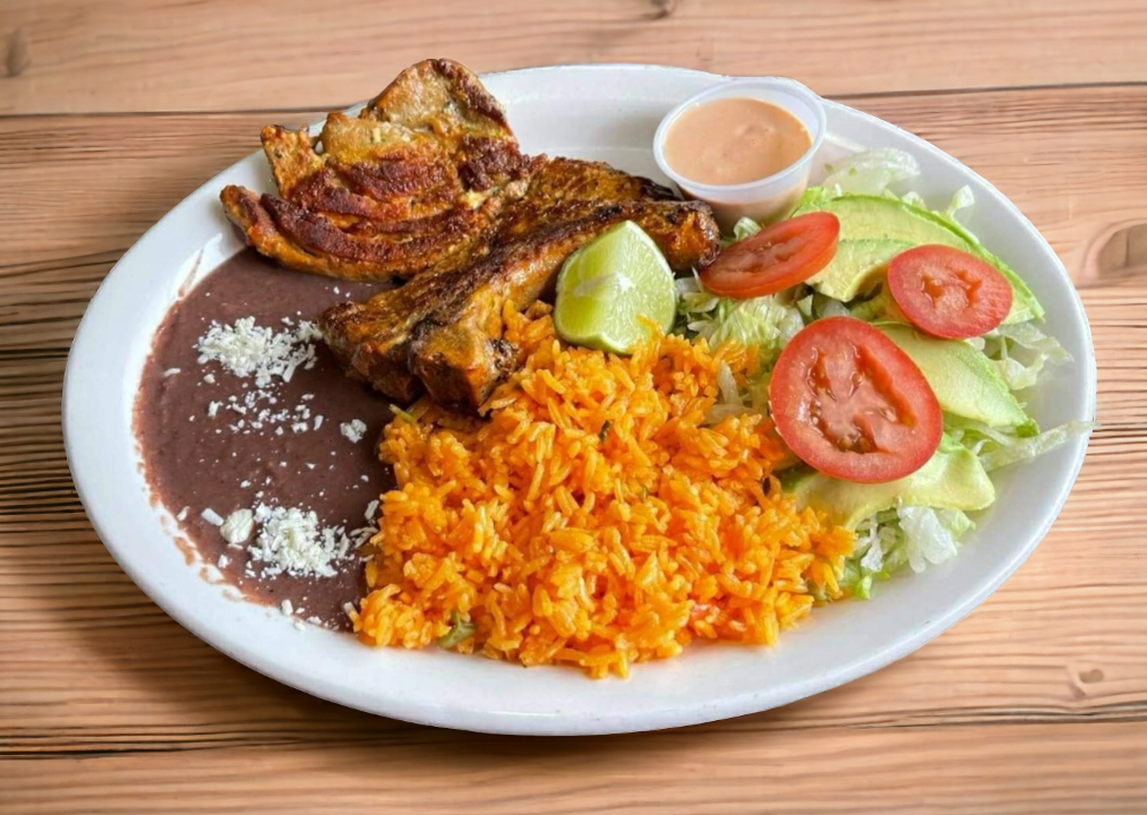 Chuleta A La Plancha - Grille Pork Chop.