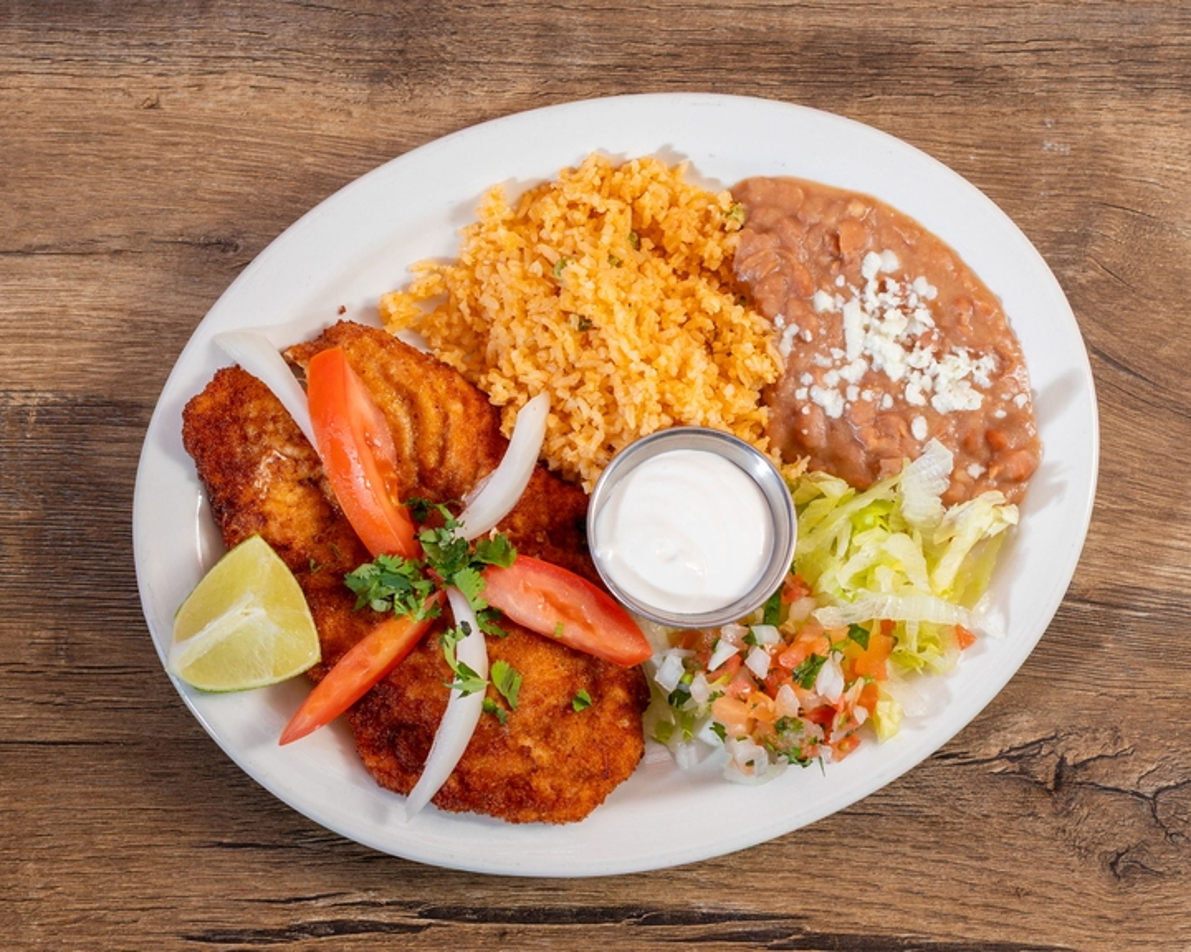 Milanesa de Carne (Steak).
