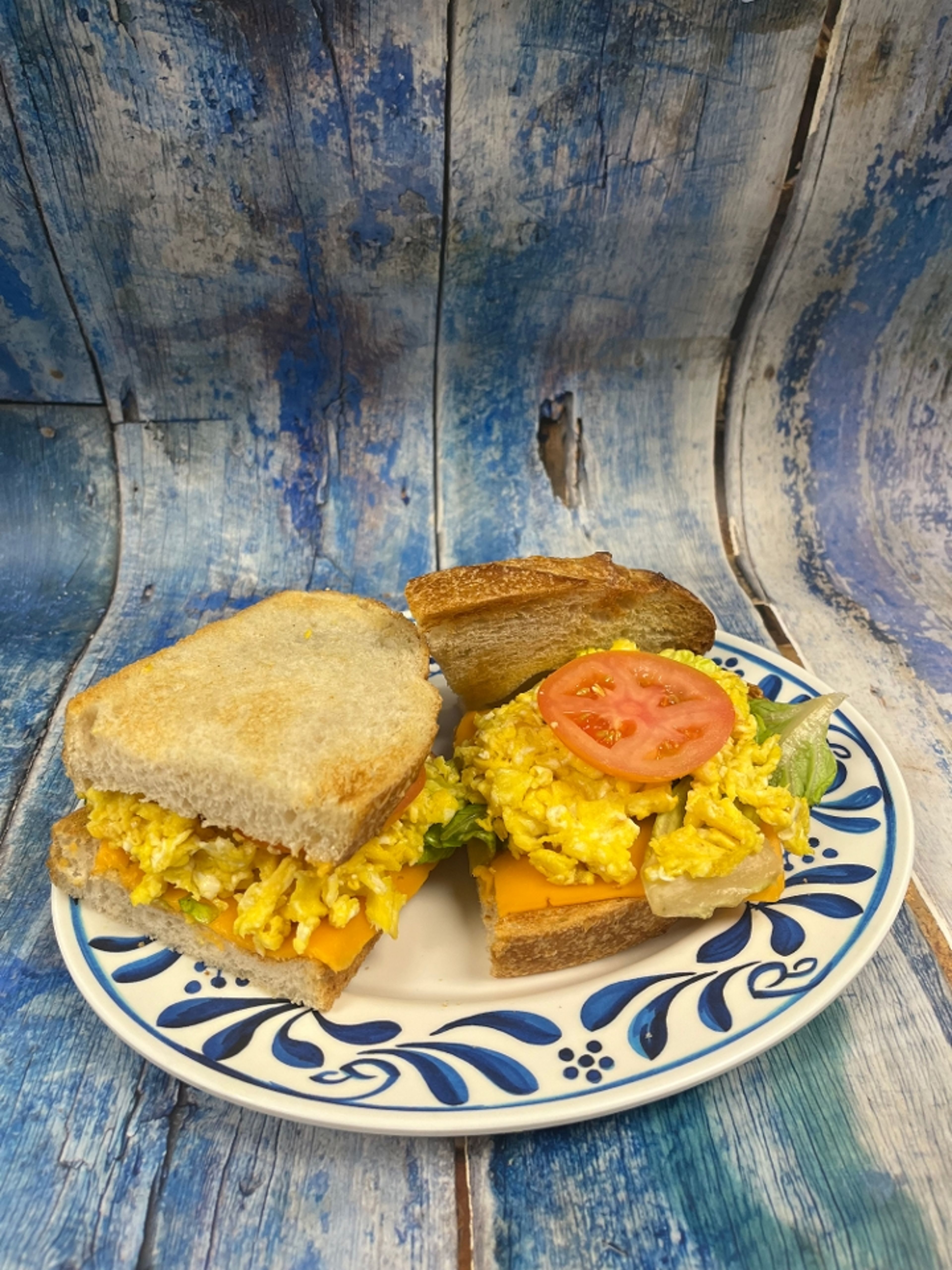 CHEESY OINK OINK BREAKFAST SANDWICH.