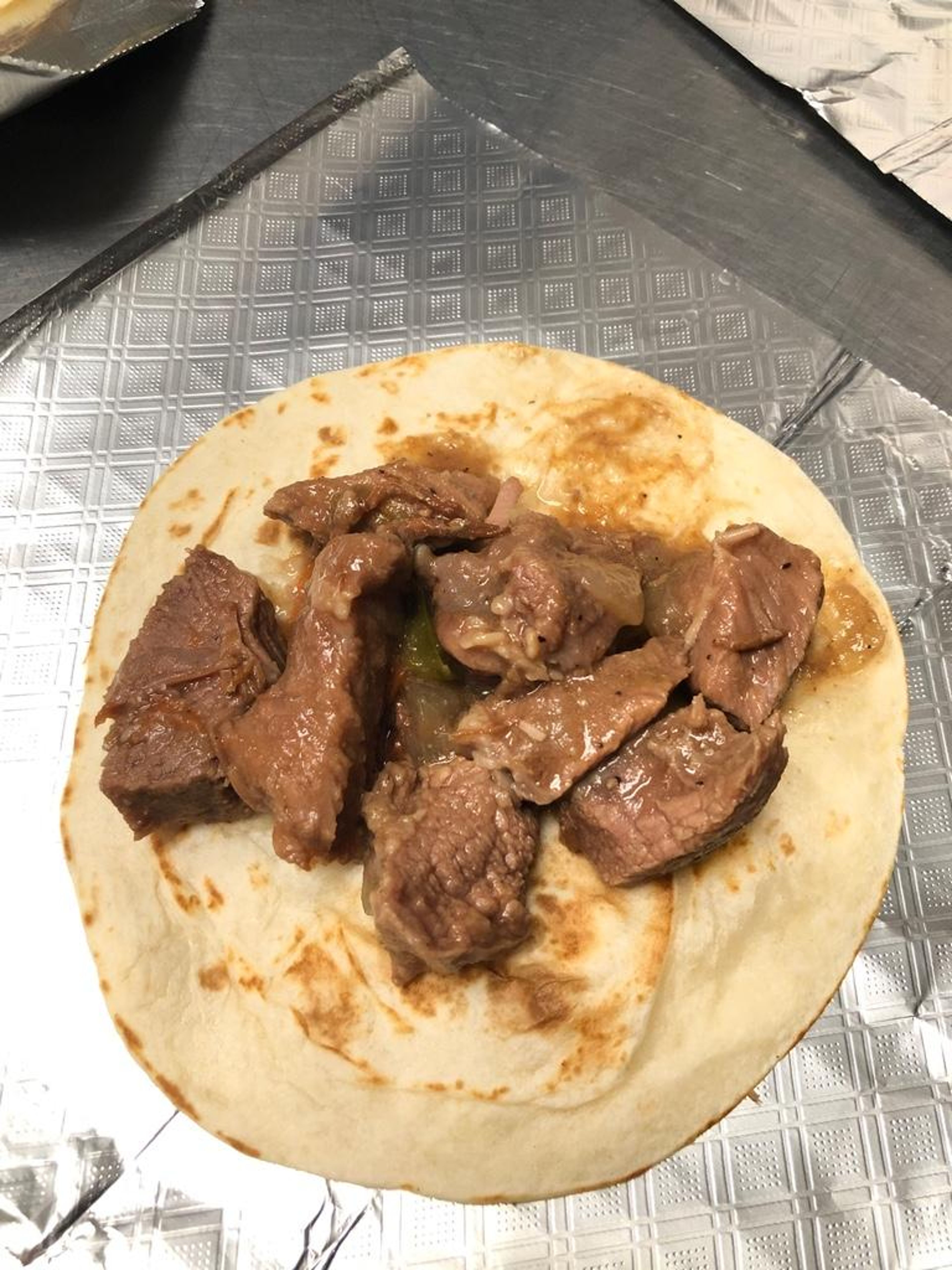 Carne Guisada (Available at 8am).